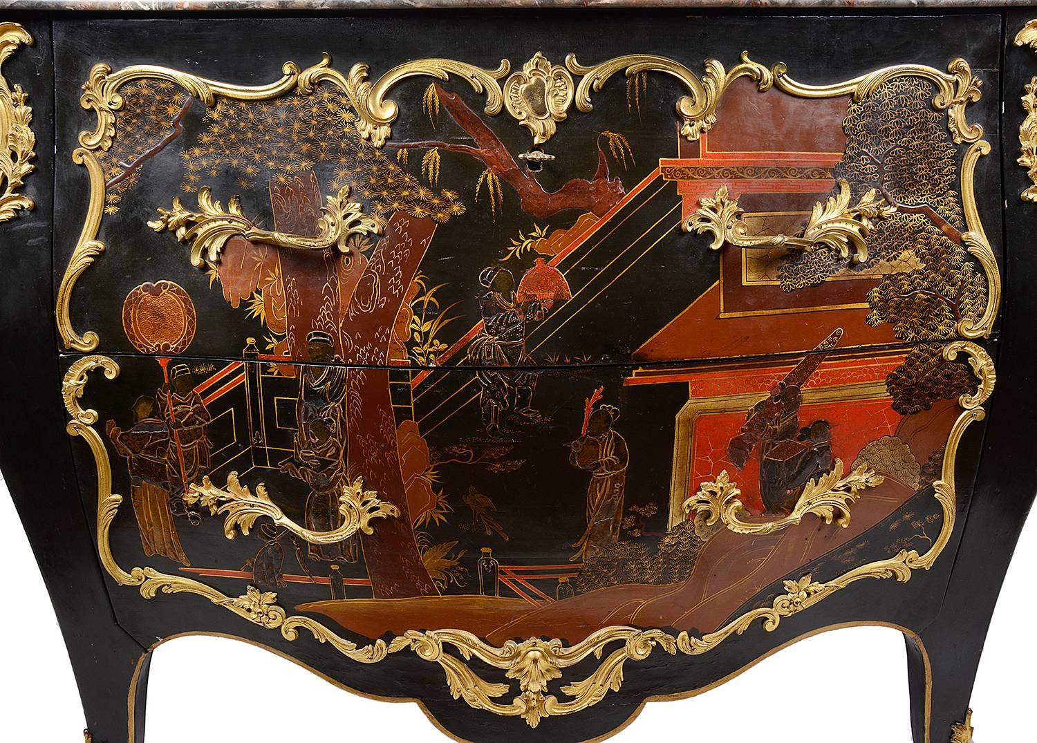 A very good quality early 19th century French Chinoserie lacquer commode, having and serpentine marble top, above two deep drawers, each with an oriental scene and ormolu mounts, raised on out swept legs terminating in scrolling ormolu