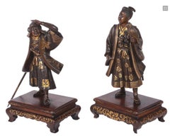 A pair of Japanese Miyao Bronze Statues of a Falconer and warrior, Meiji period.