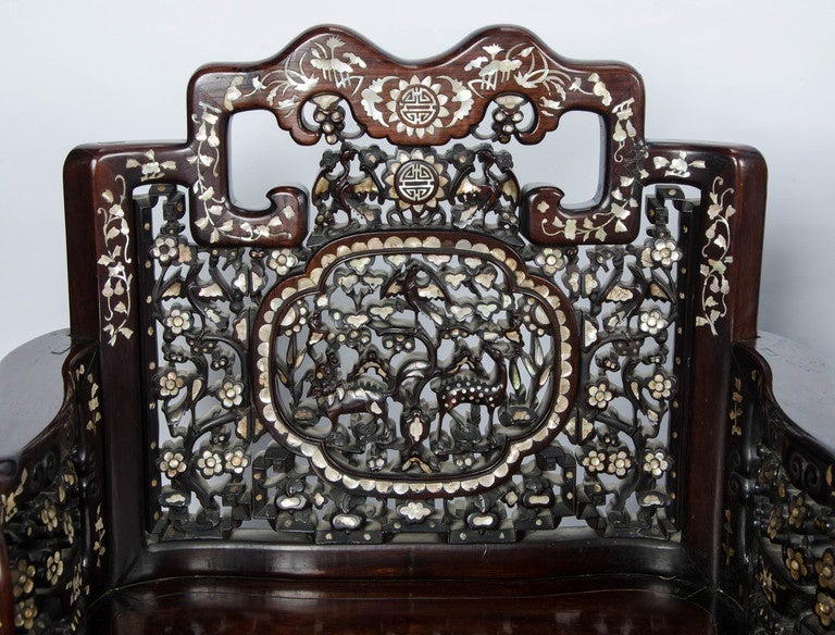A very good quality pair of Chinese 19th Century hardwood, mother of pearl inlaid arm chairs
