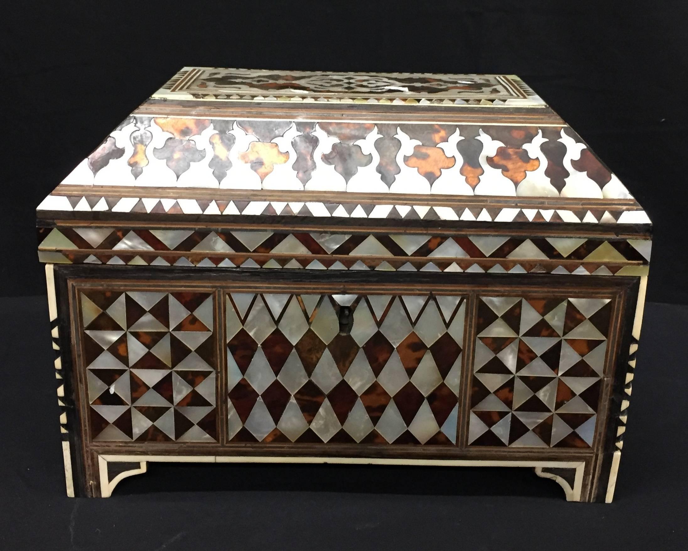 An Ottoman, Turkish, Scribe's box, the wood carcass inlaid with tortoiseshell and mother-of-pearl.