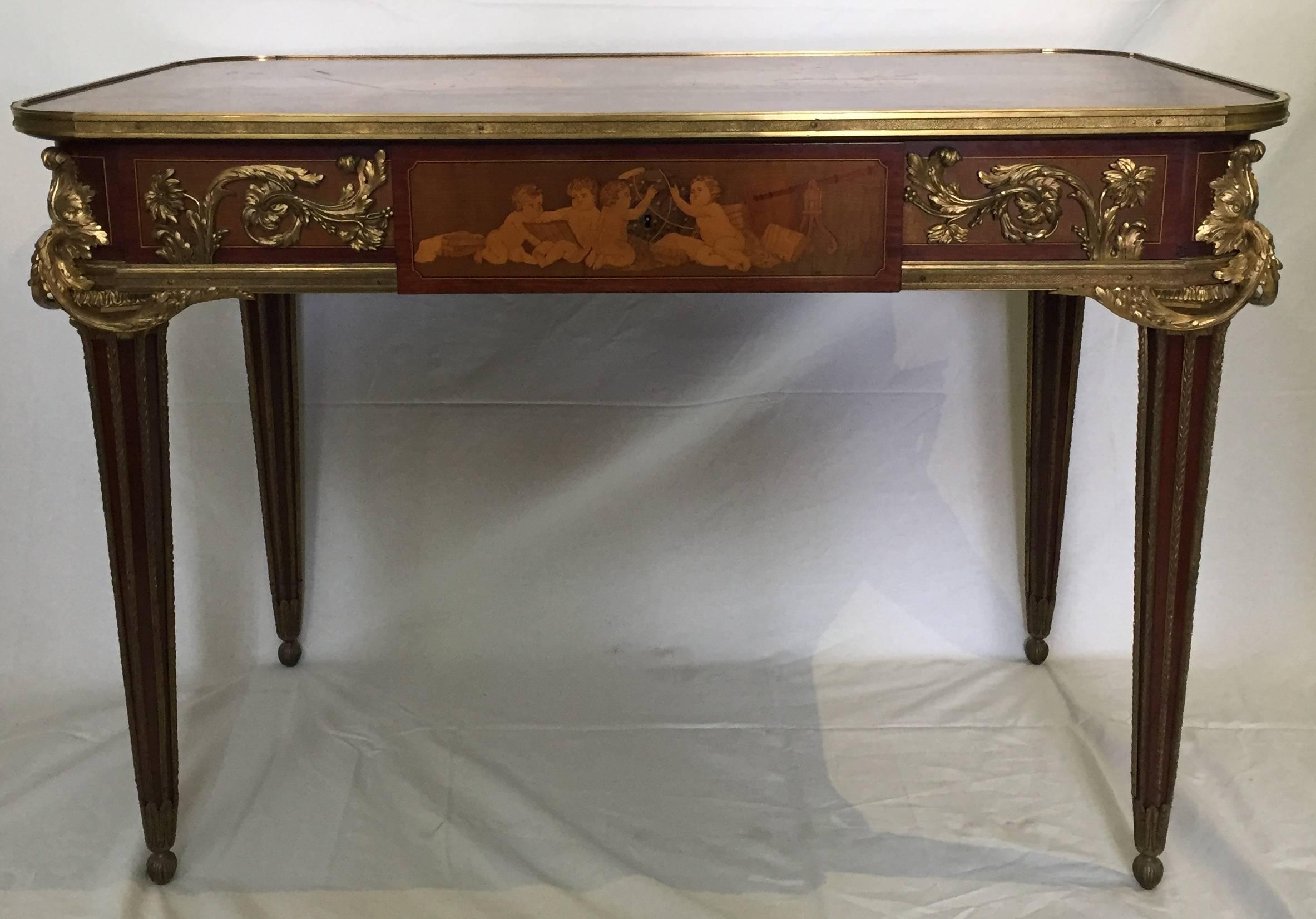 A fine quality French 19th century marquetry inlaid centre table, stamped Maison Krieger, Paris. Having wonder classical inlaid scenes to the top and sides, ormolu mounts, a single frieze drawer and raised on turned tapering fluted legs.