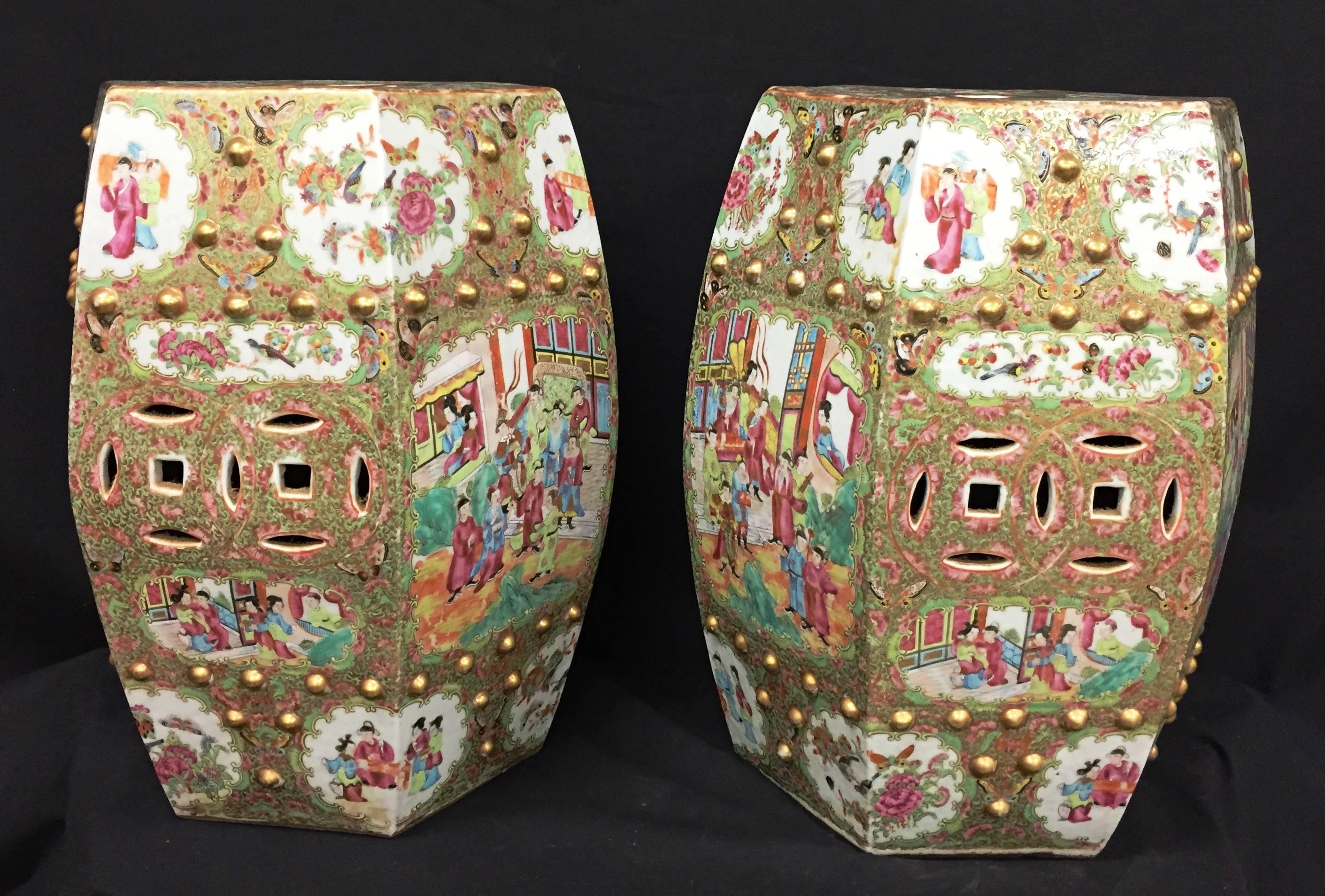 A good quality pair of Chinese rose medallion / Cantonese porcelain garden seats, 19th century. Each with classical Chinese scenes painted within panels and gilded decoration.