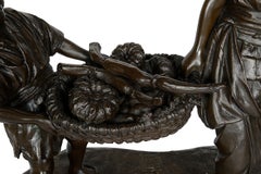 Japanese bronze mother + child carrying fruit