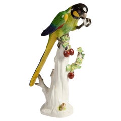 Meissen Parrot, perched on a tree trunk, C19th 26cm