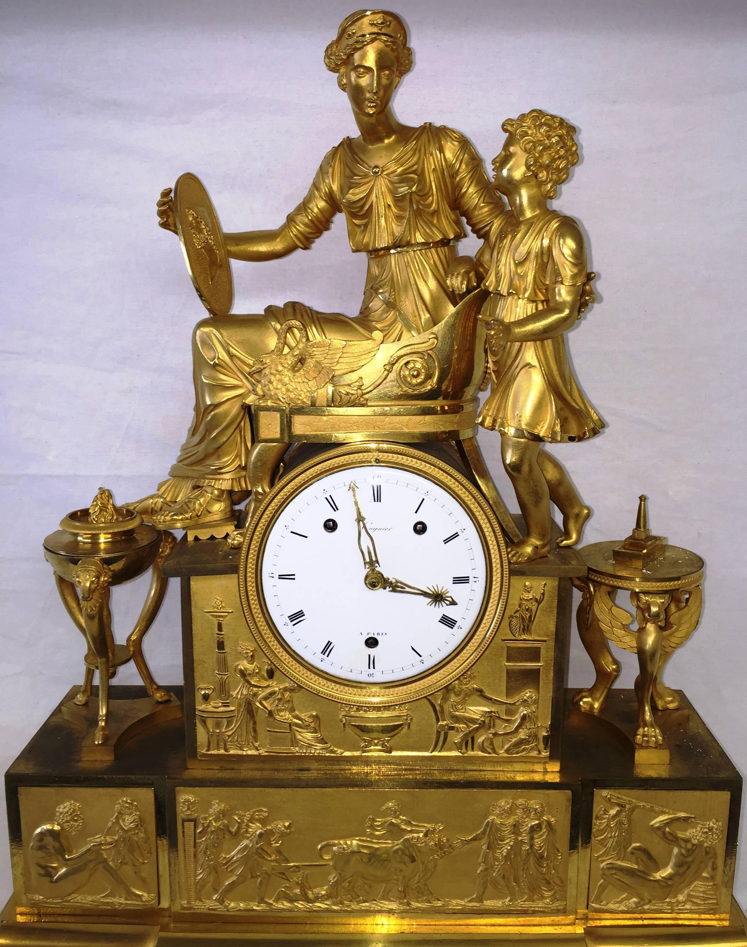 A very impressive 18th century French Empire gilded ormolu mantel clock. Depicting mother and child and various classical panels in relief. The three train striking and repeating movement. 
Signed to the face; Cugnier, Paris.