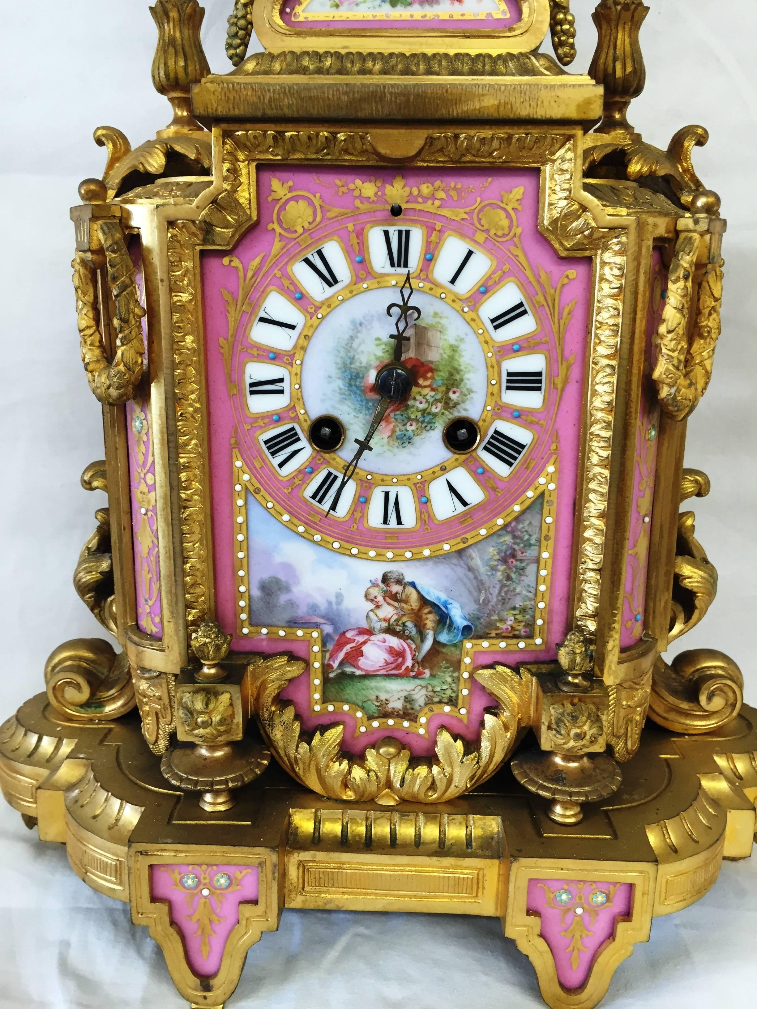 Cast 19th Century French Sevres Porcelain Clock Set For Sale