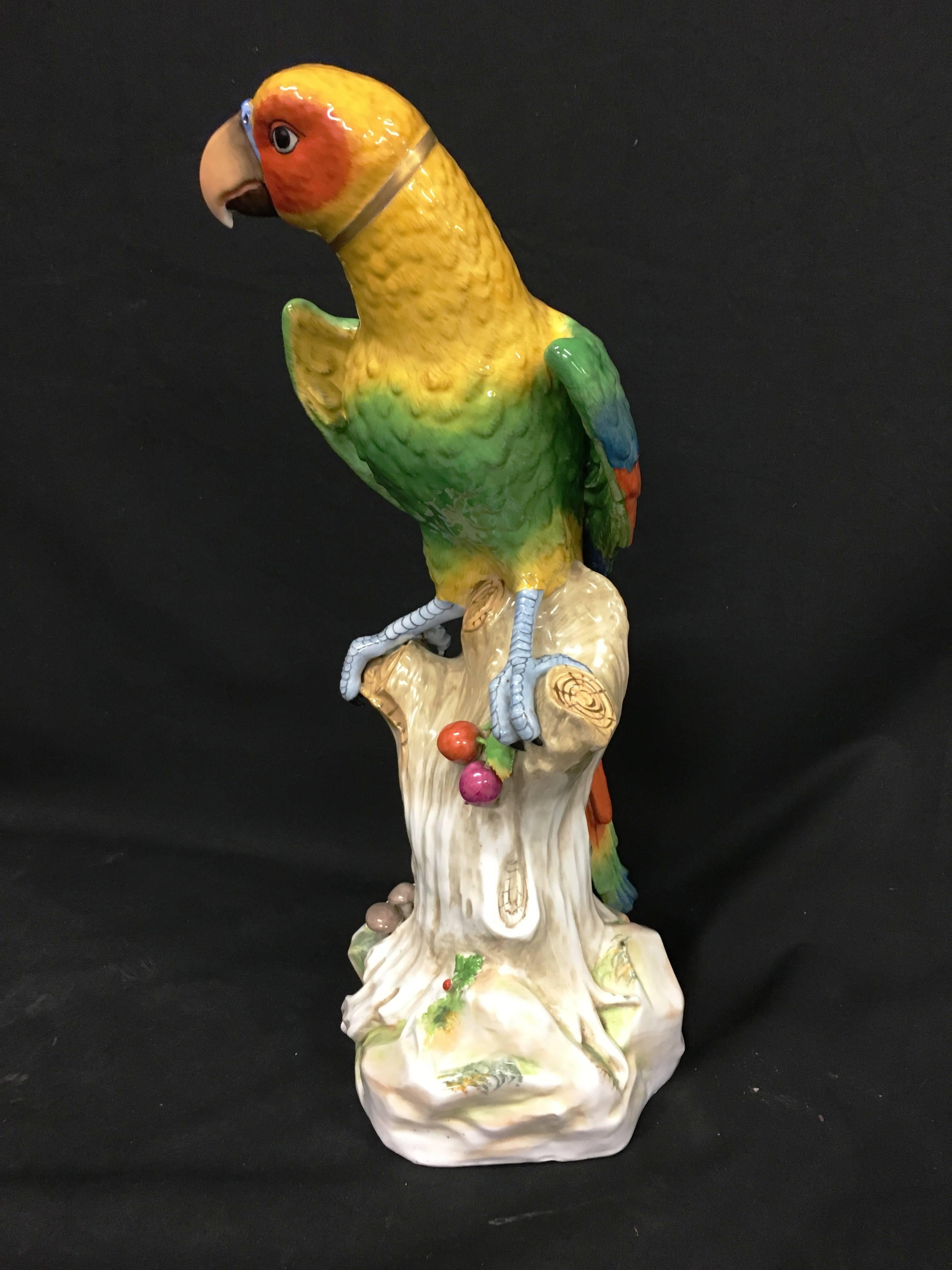 A very impressive 19th century Samson porcelain parrot in the style of Meissen. Having wonderful bold coloring and mounted on a tree stump.