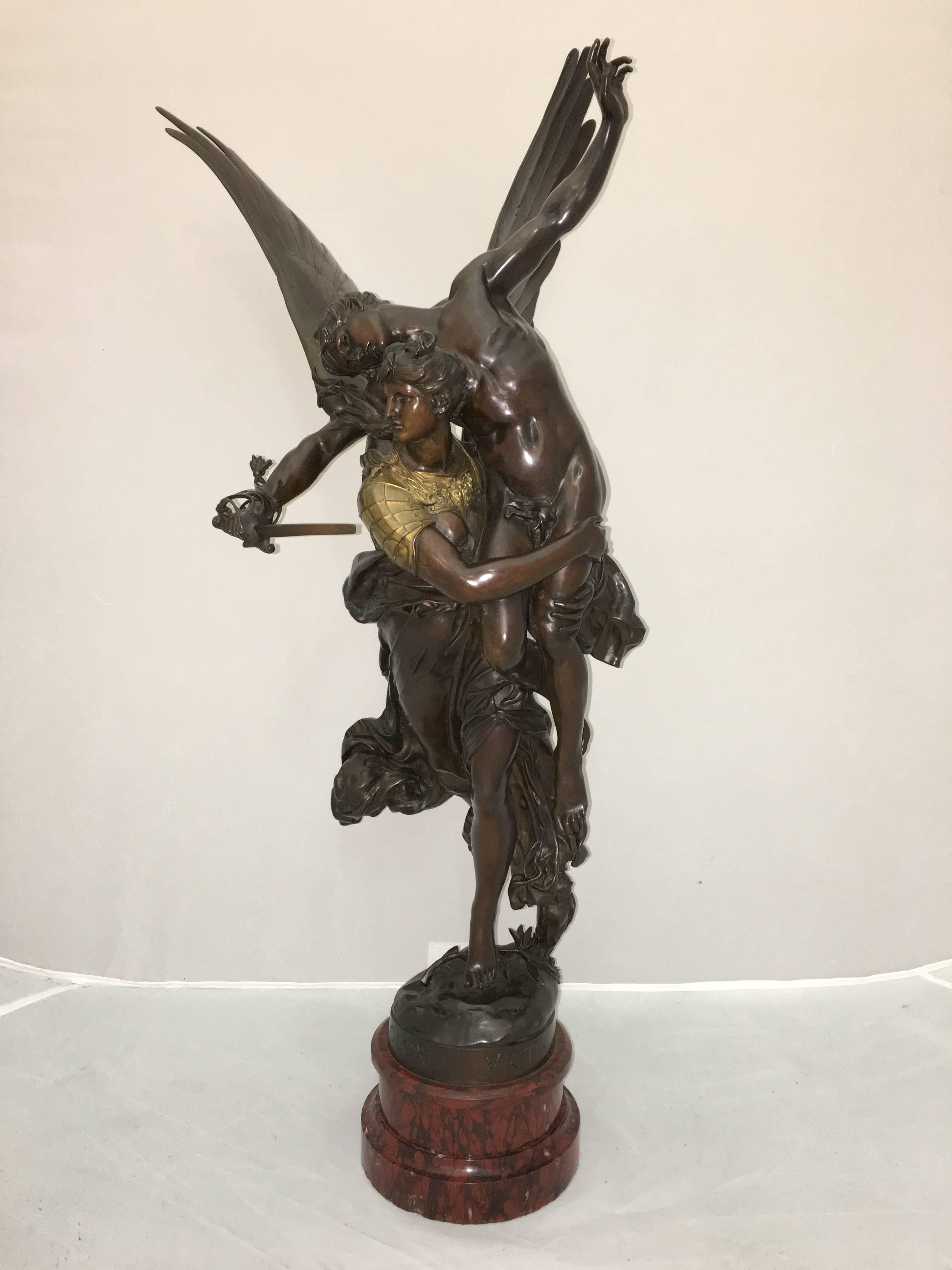 A fine quality French 19th century bronze statue depicting 'Gloria Victis' signed;
A. Mercie. Barbedienne. Having gilded relief and mounted on a rouge marble plinth.