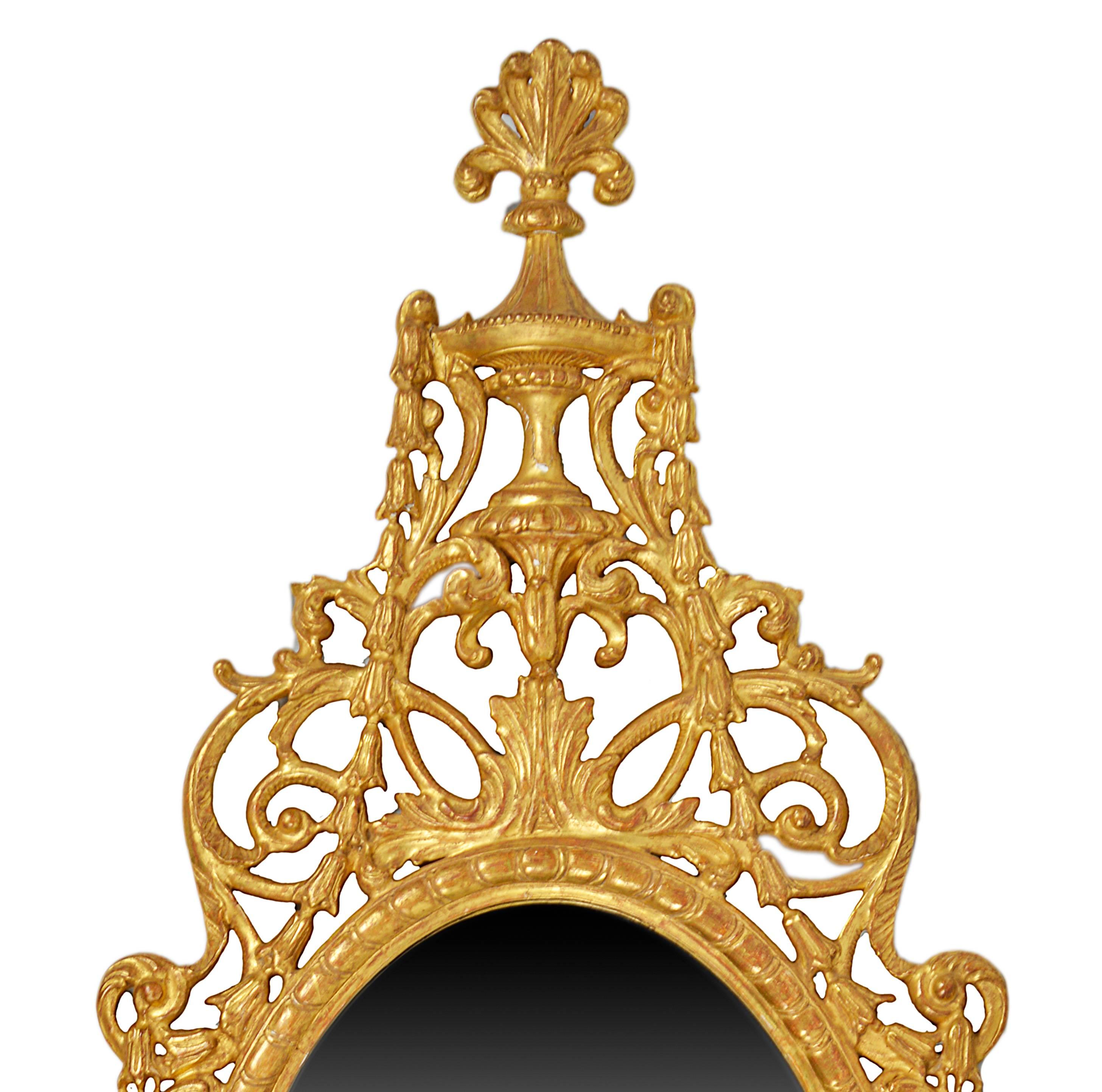 A good quality 18th century style carved giltwood Pier glass mirror, having Adam influences carved giltwood swags, drapes and scrolls.