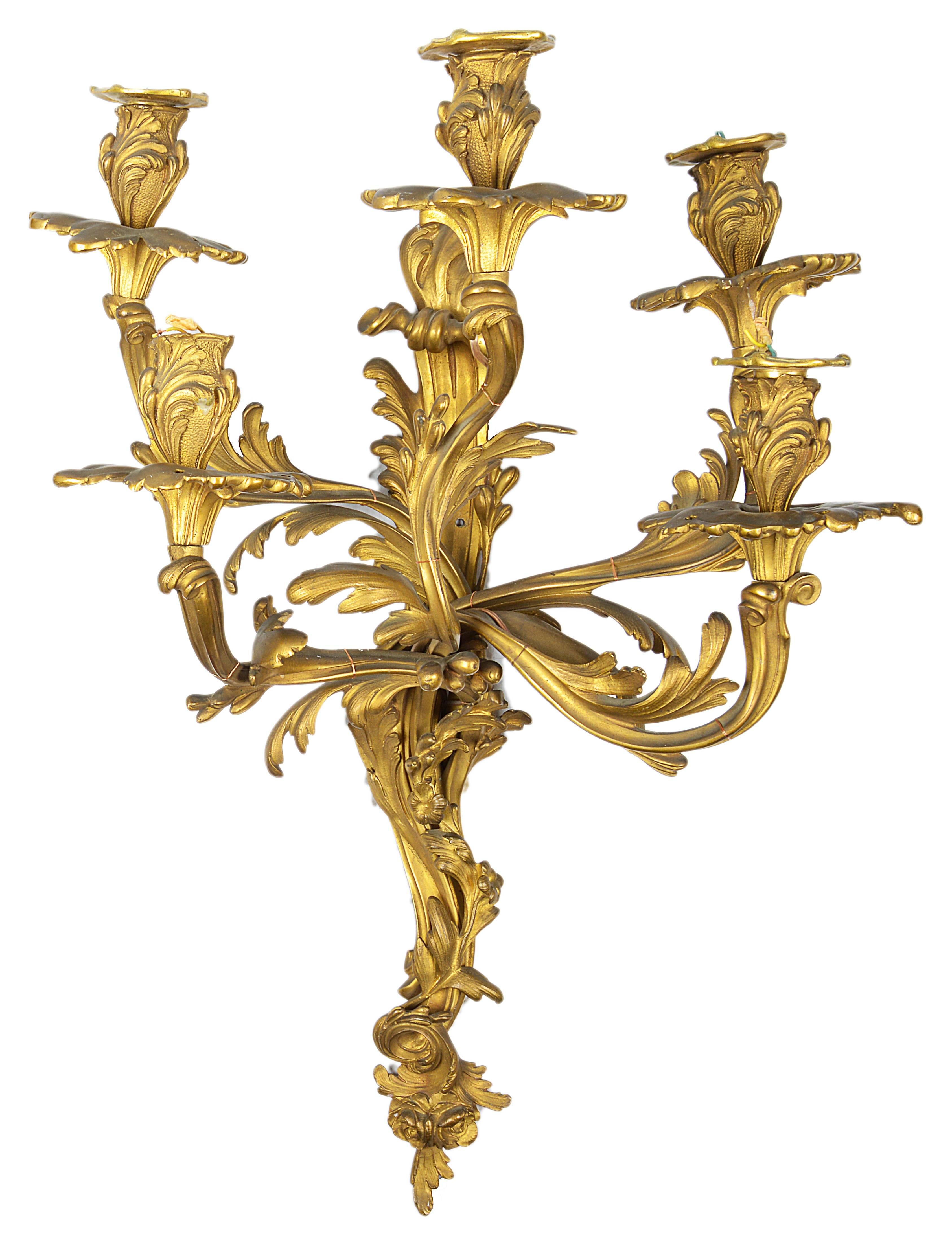 A good quality pair of 19th century French gilded ormolu Rococo influenced six branch wall lights.