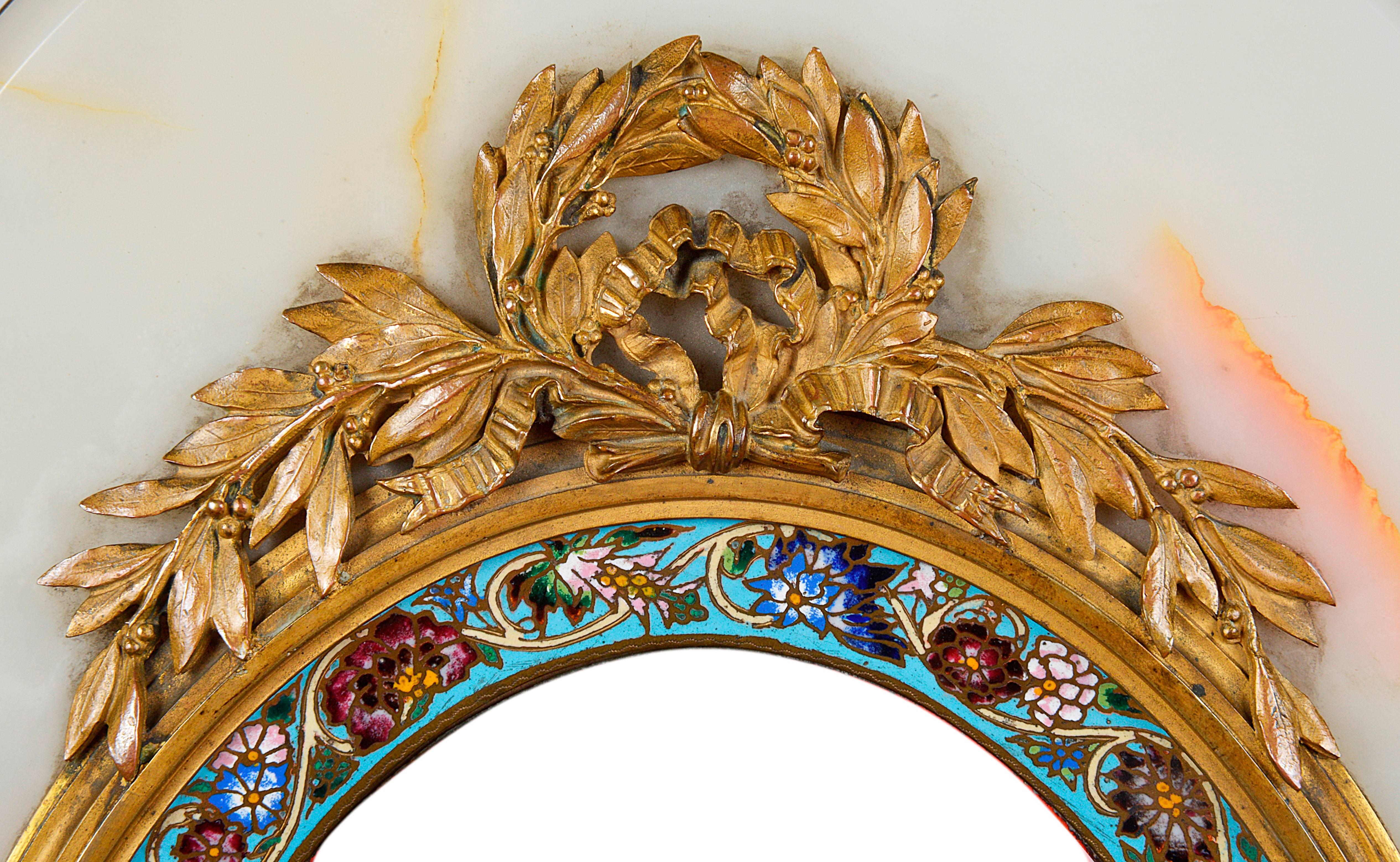 A very good quality French gilded ormolu, onyx and champlevé enamel Dressing table mirror. The ormolu having foliate and ribbon decoration.