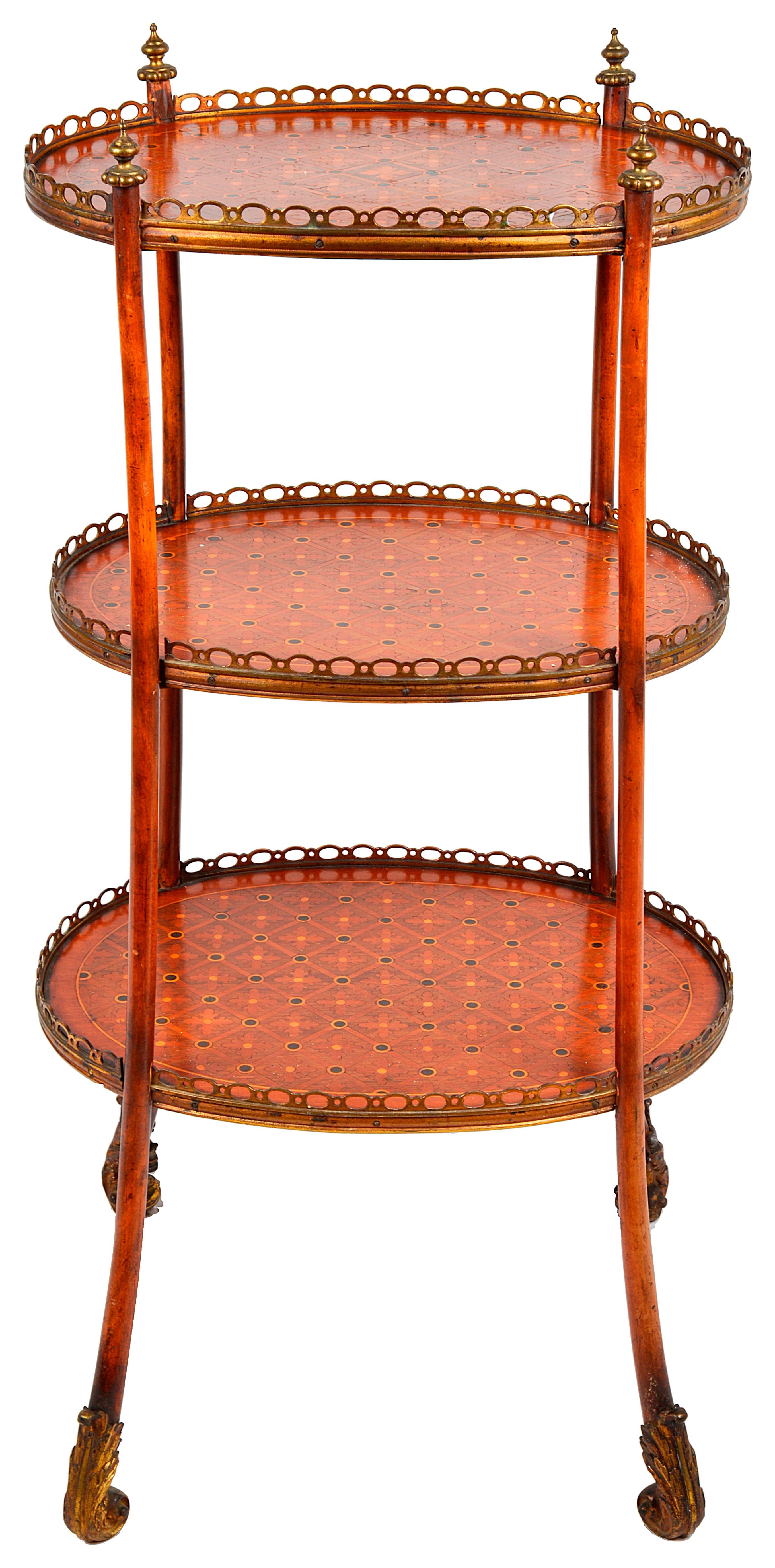 A good quality 19th century, parquetry inlaid three-tier etagere with ormolu mounts in the Louis XVI style.
