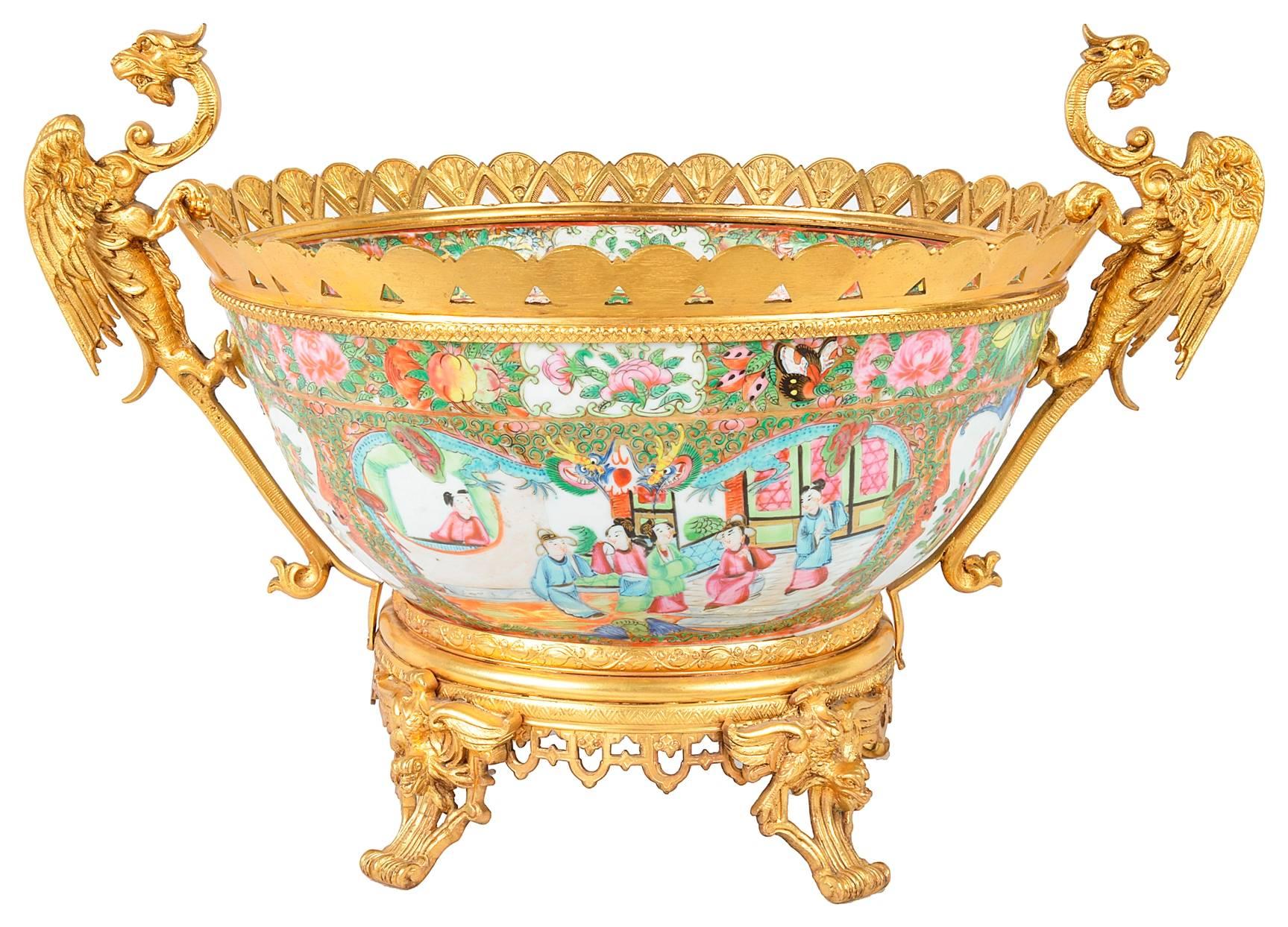 A good quality late 19th century canton / rose medallion bowl, having classical oriental decoration and gilded ormolu mounts.
