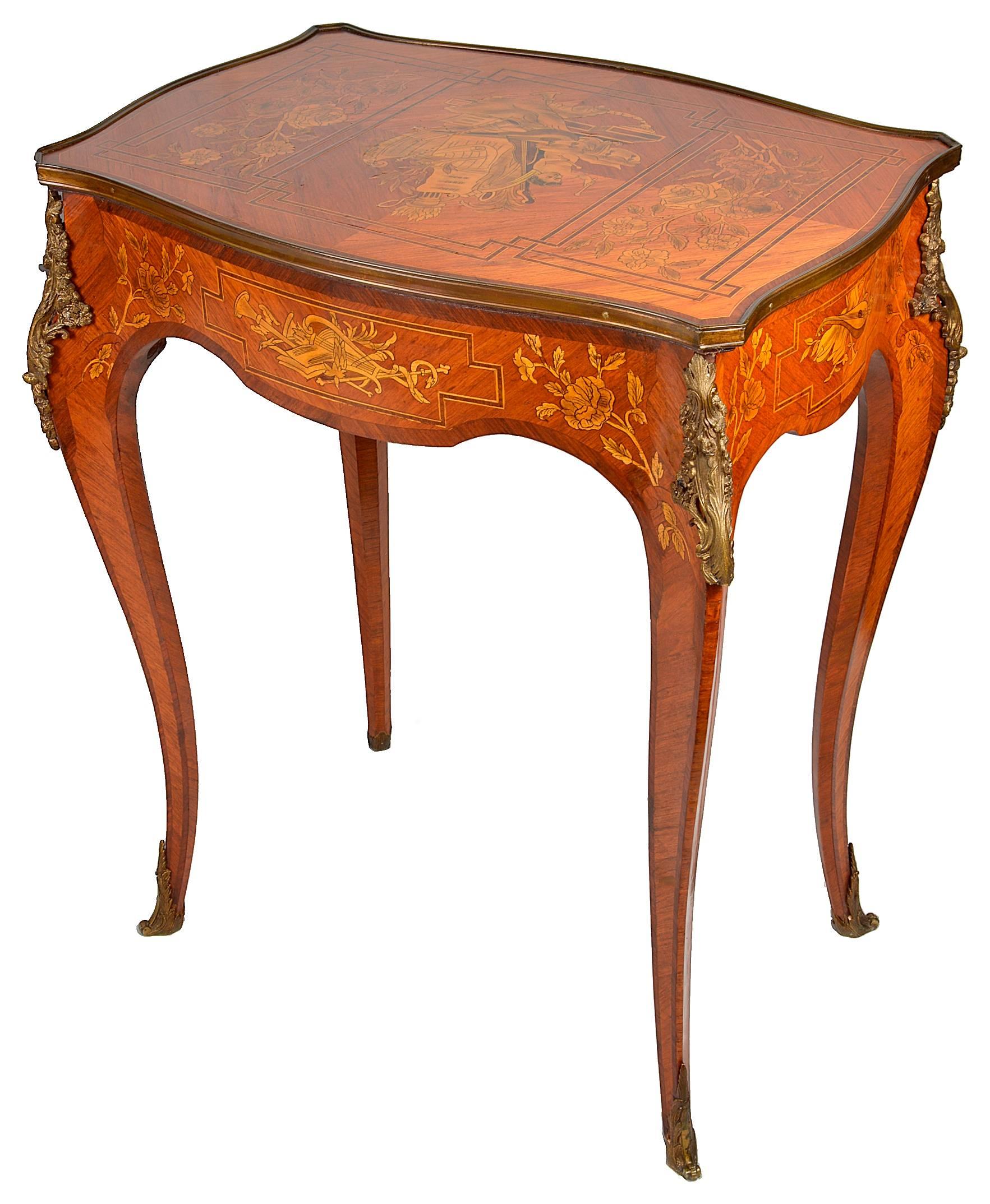 A pair of good quality French marquetry side tables in the Louis XVI style. Each having a slide, classical inlaid decoration to the tops and frieze, raised on elegant cabriole legs and ormolu mounts.
