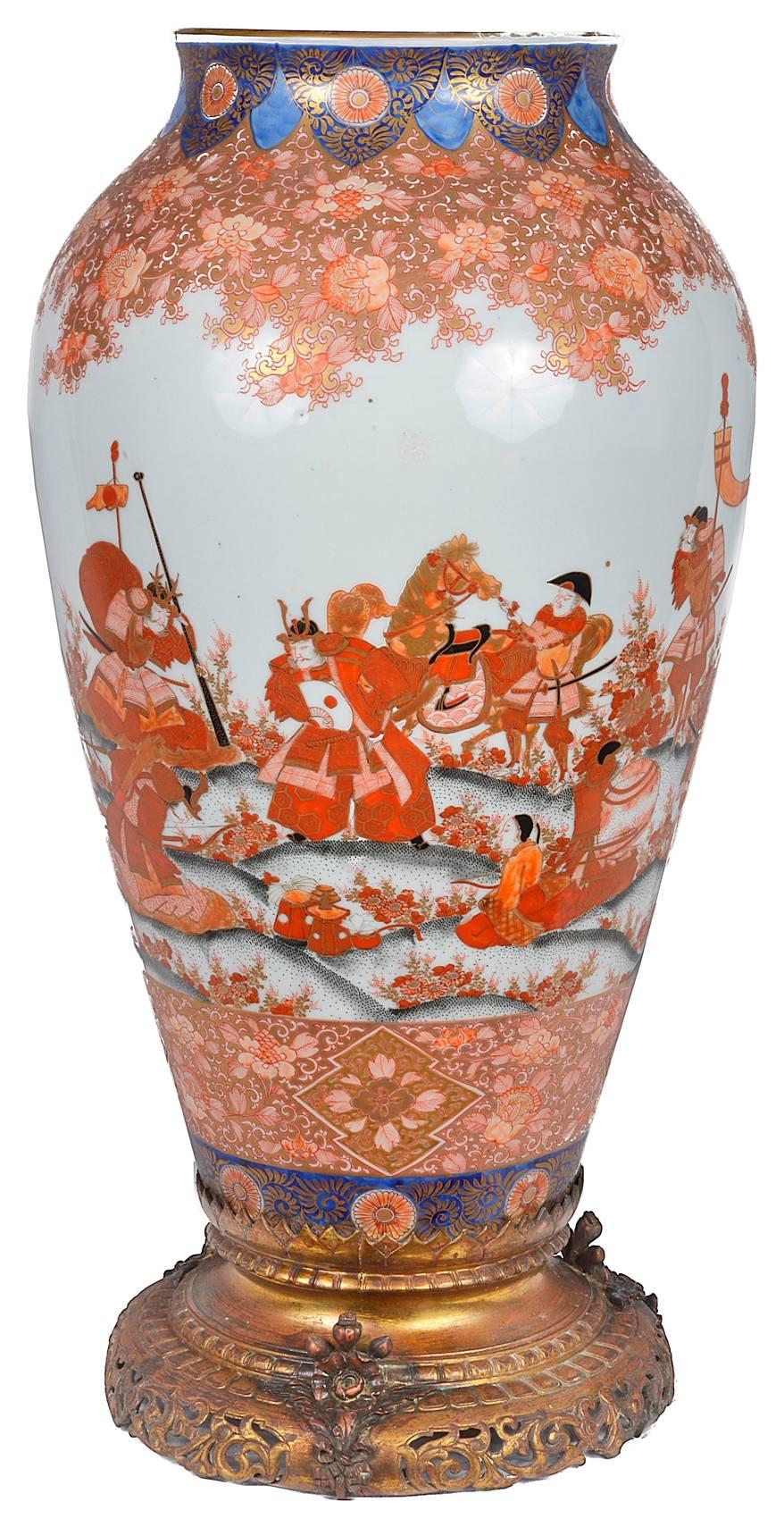 A very good quality, 19th century, Japanese Fukagawa porcelain vase or lamp. Having wonderful hand-painted scenes of Samurai warriors, some on horseback going to battle. Mounted on a gilded ormolu base.
Wiring can be arranged.
 