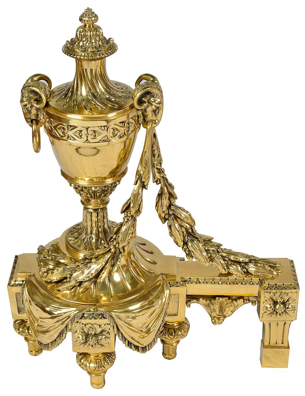 A good quality, French brass fire place fender, in the Louis XVI style. Having classical urns on either side with ram's head mounts and foliate swags. An adjustable central section with scrolling decoration allowing the fender to fit larger and