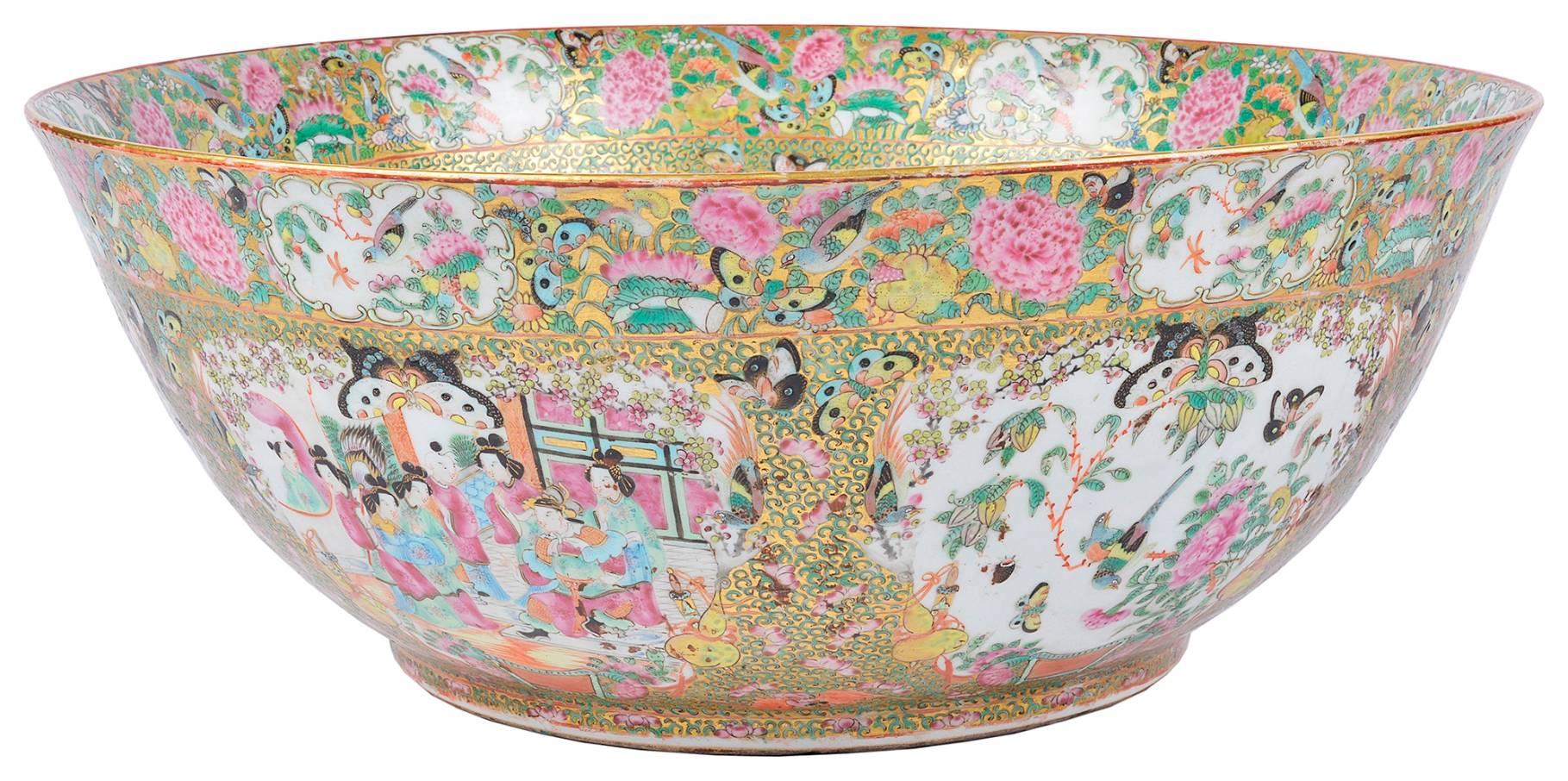 A good quality large 19th century Chinese cantonese/rose medallion bowl. Having classical oriental scenes painted and set in boarders of flowers, birds and butterflies.