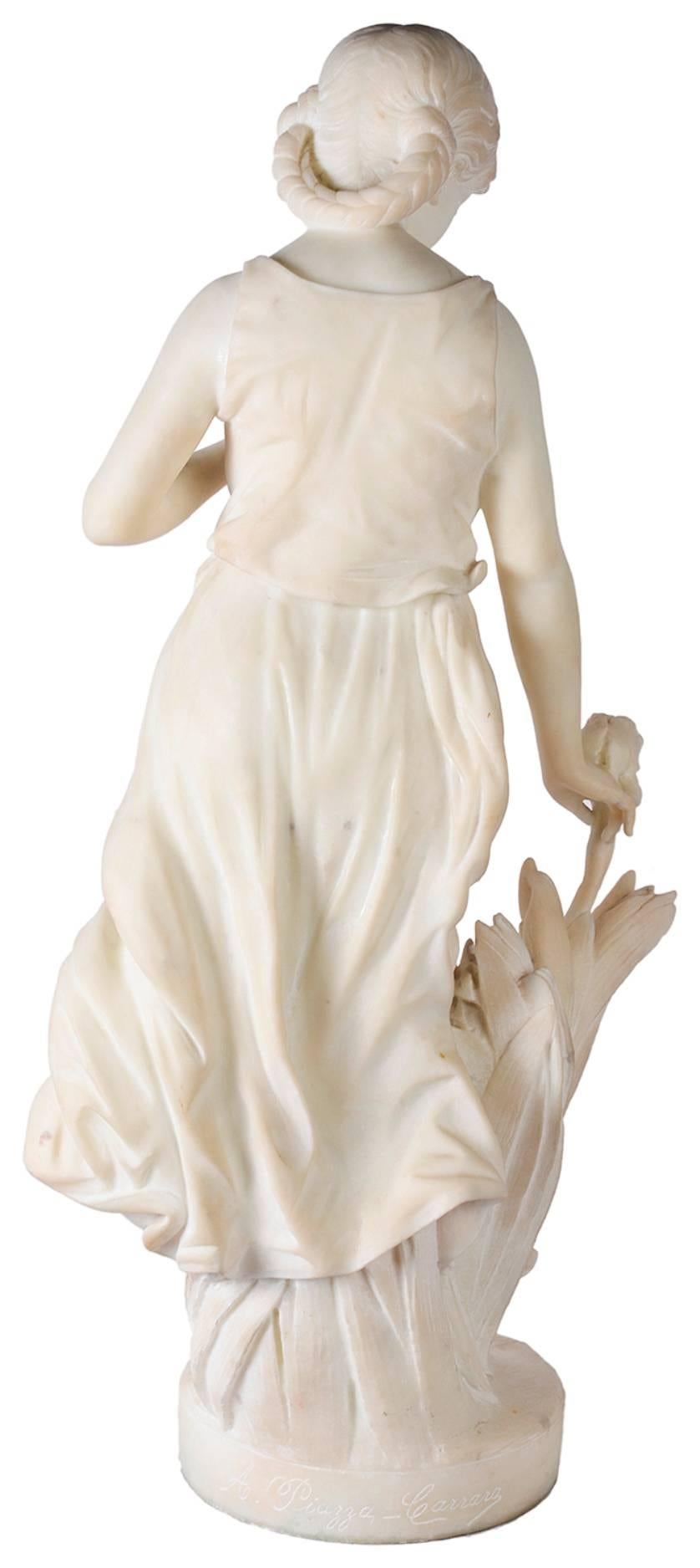 A very pleasing marble statue of a young girl holding a flower,
Signed; A, Piazza-Carrera.