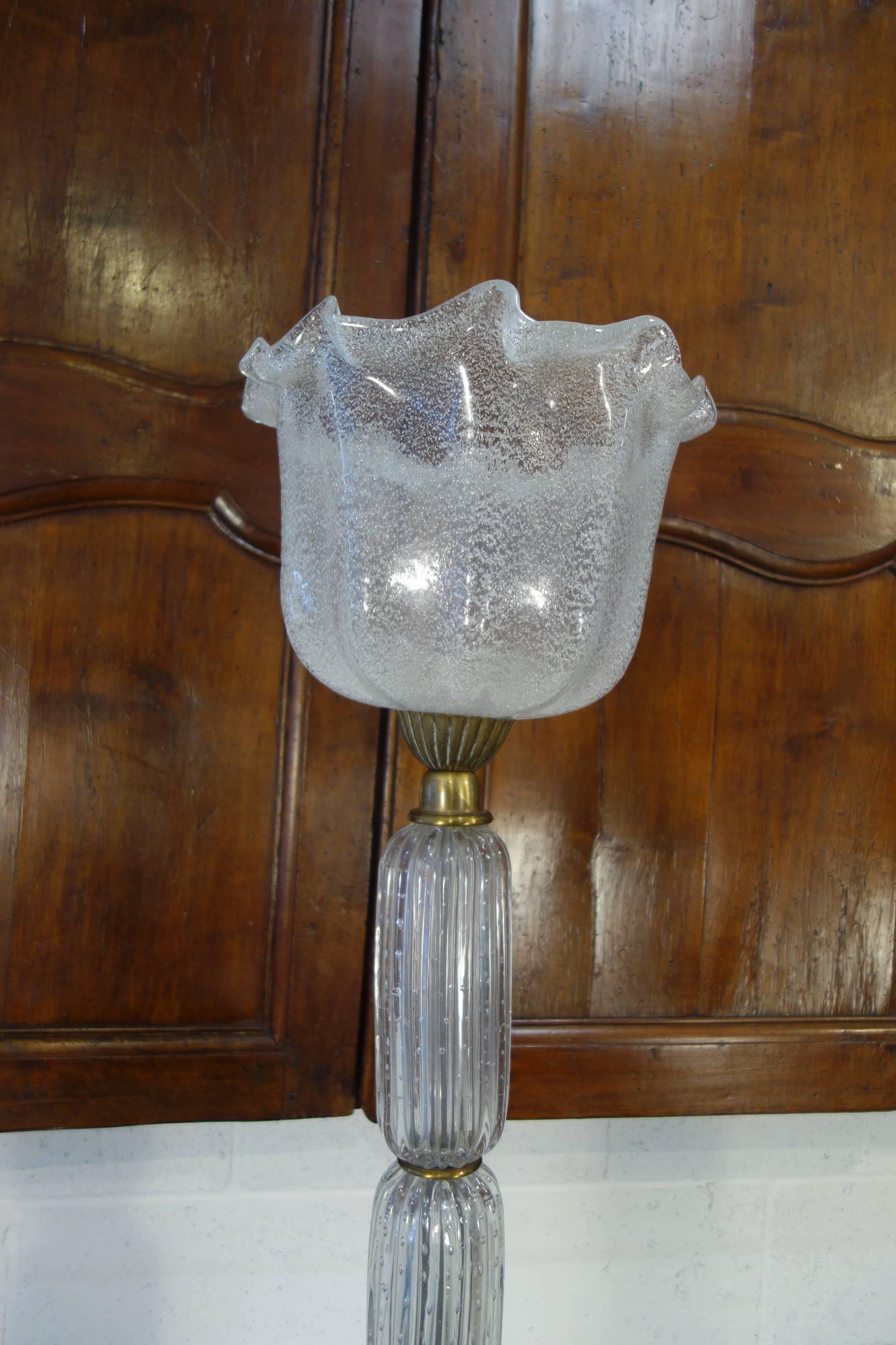 Classy Murano floor lamp with scalloped ice glass shade and segmented bubble glass on brass stand.  UL rewired.

Measures: 68