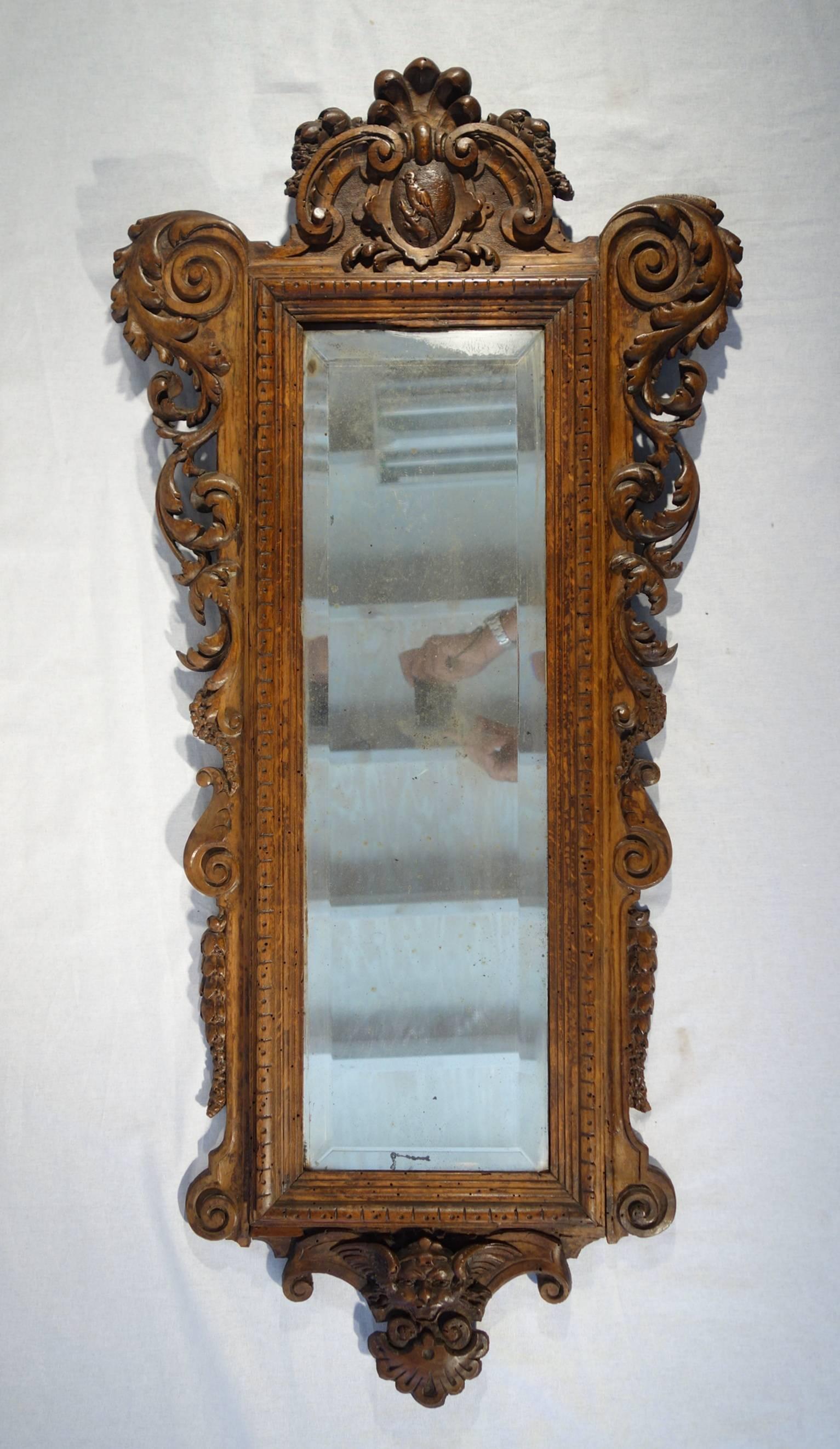 Rare pair of walnut hand-carved mirrors attributed to master artist Valentino Besarel (b. July 29 1829, d. Dec 11 1902) of Venice, Italy. Renaissance Revival.  High quality; soft, fine, deep hand carving.
Besarel was a 3rd generation of carvers: he