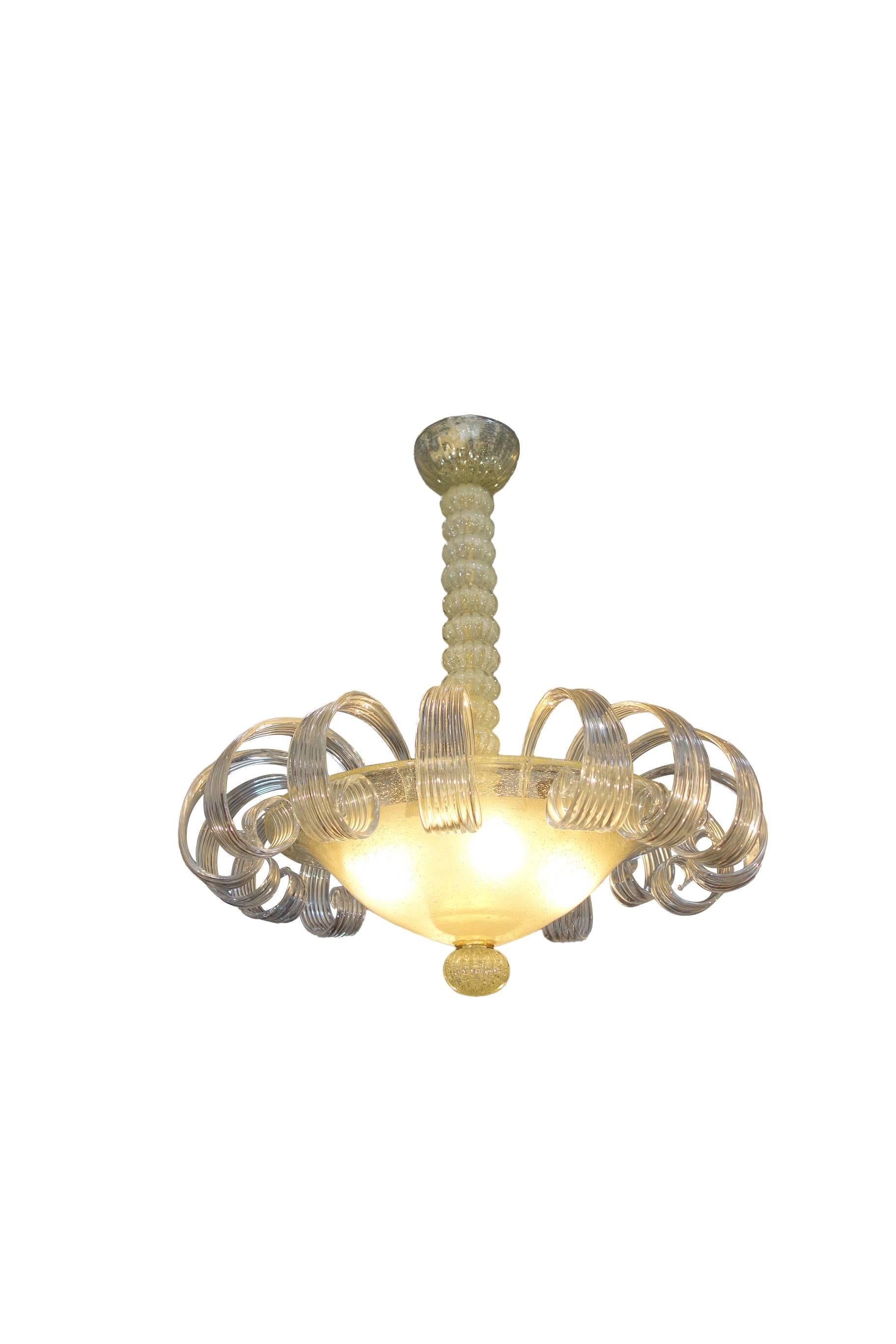 Spectacular vintage Murano Due chandelier, Venice Italy.
Frosted bubble art glass bowl suspends on gold finish bauble-shafted fixture, supporting 16 clear and ribbon-curled "eyelash" petals - producing a soft golden hue from the center of