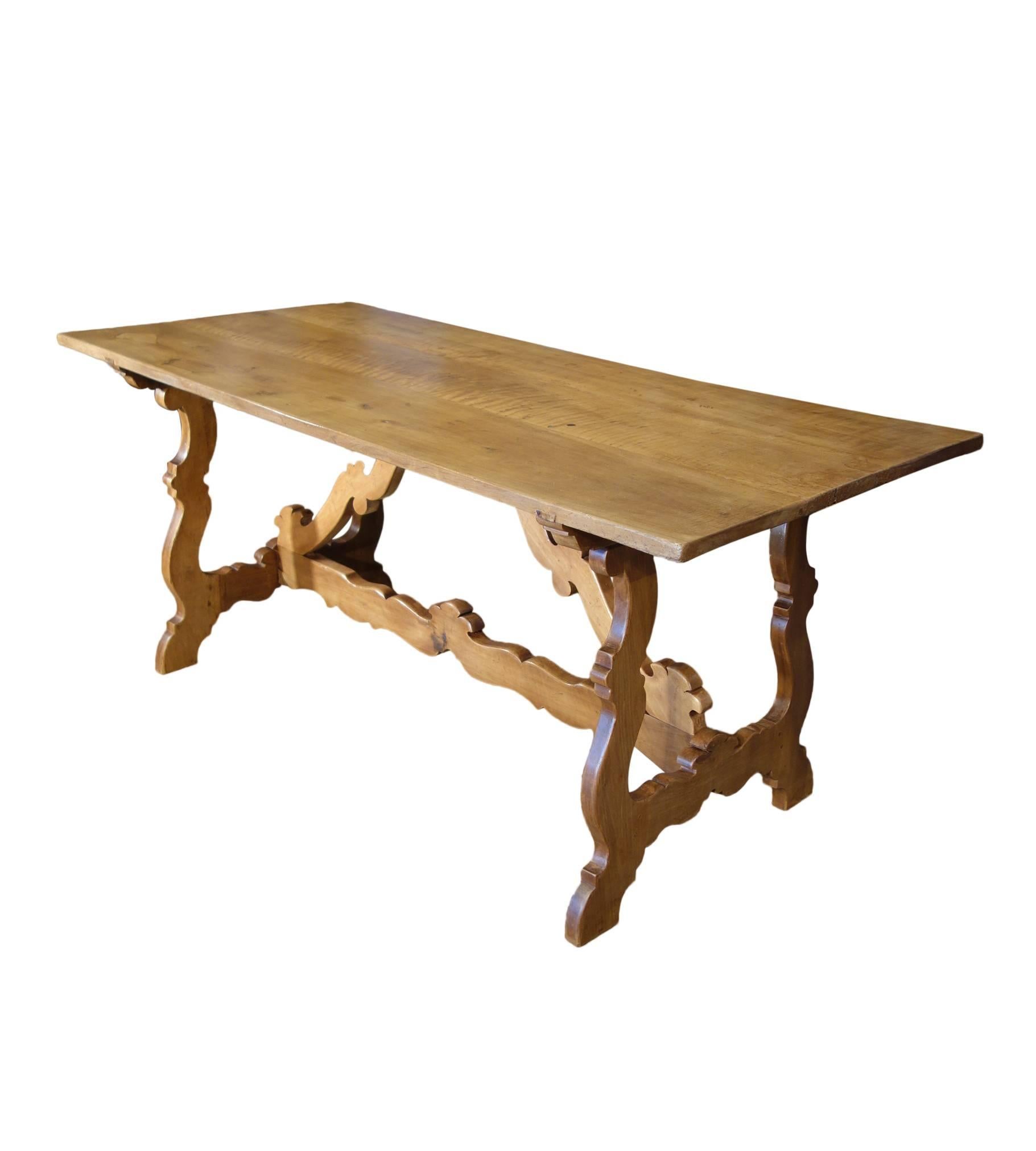 17th Century refectory style, solid walnut table, with hand carved lyre-shape bases and stretcher - authentic Tuscan motif, circa 1820. Perfect for entry, console, dining or desk table.
Introducing Bellini Antiques' 