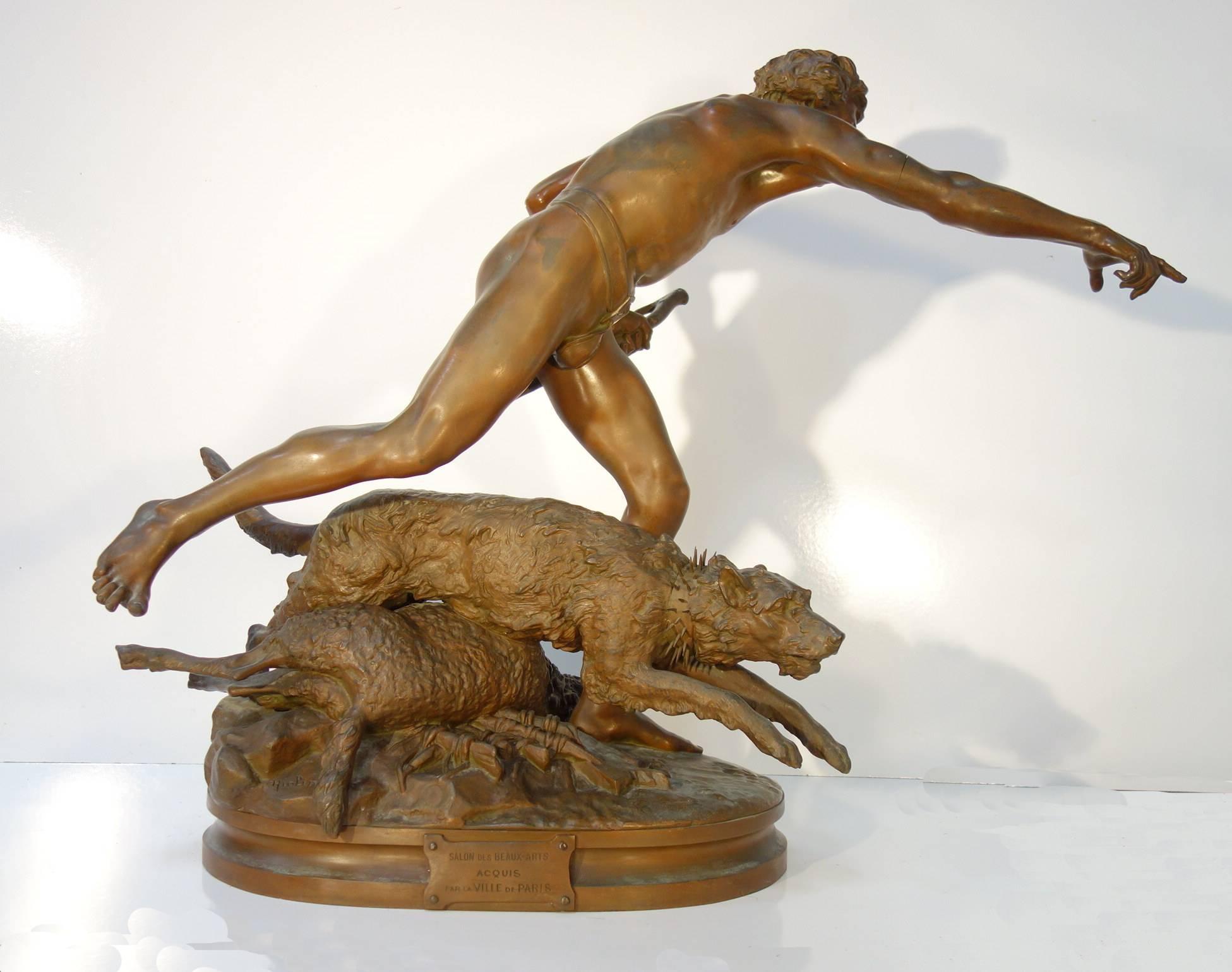 Bronze statue, signed Hiolin. A young shepherd and his dog in pursuit of a wolf sheep killer. 
Hiolin went to Paris in 1864 and entered the Ecole des Beaux-Arts the following year. He was taken prisoner in 1870 during the Franco-Prussian war and