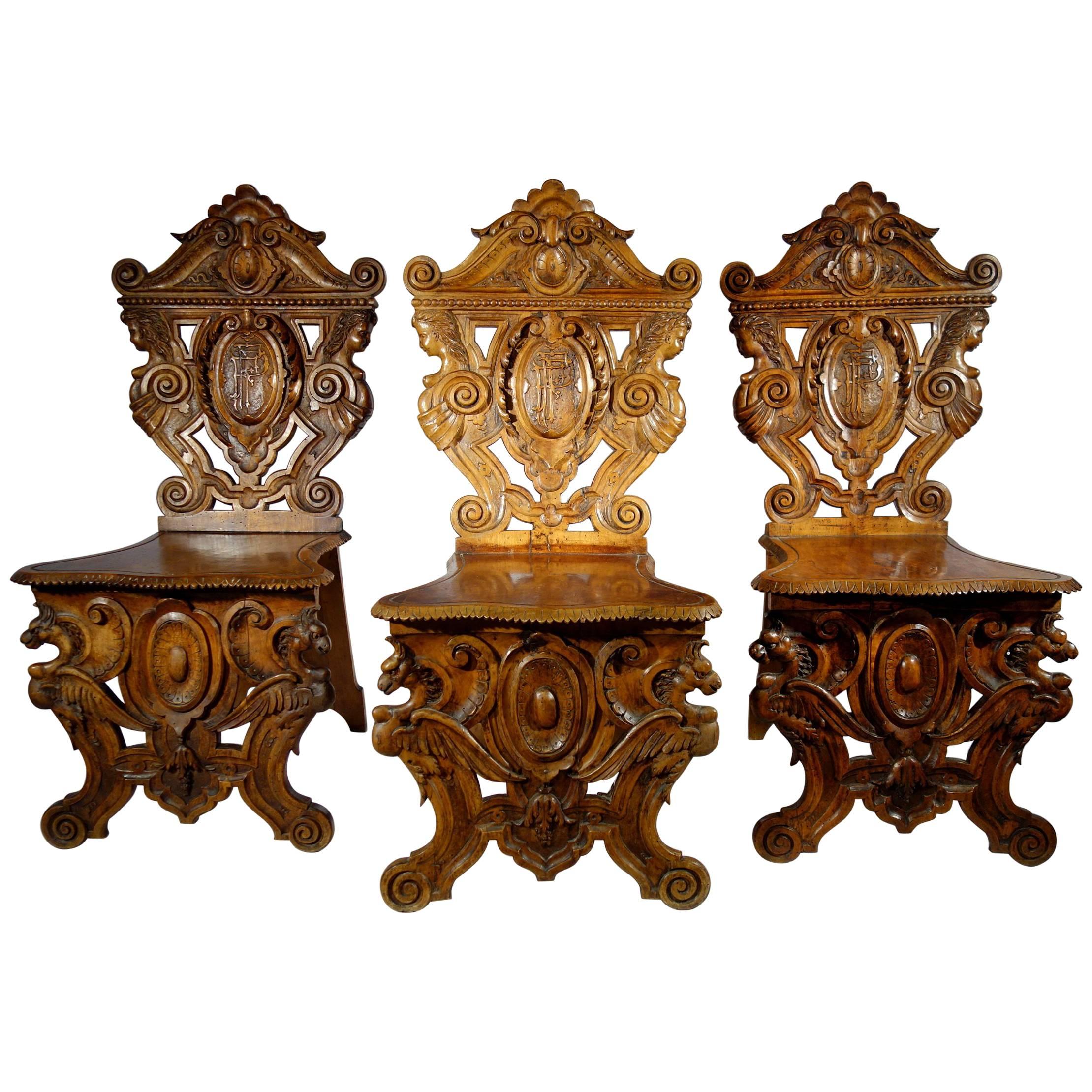 Exceptional solid walnut Sgabello hand-carved chair, attributed to master artist Valentino Besarel (b. July 29 1829, d. Dec 11 1902) of Venice, Italy. 
Renaissance Revival. 
High quality; soft, fine, deep hand carving. Monogrammed 