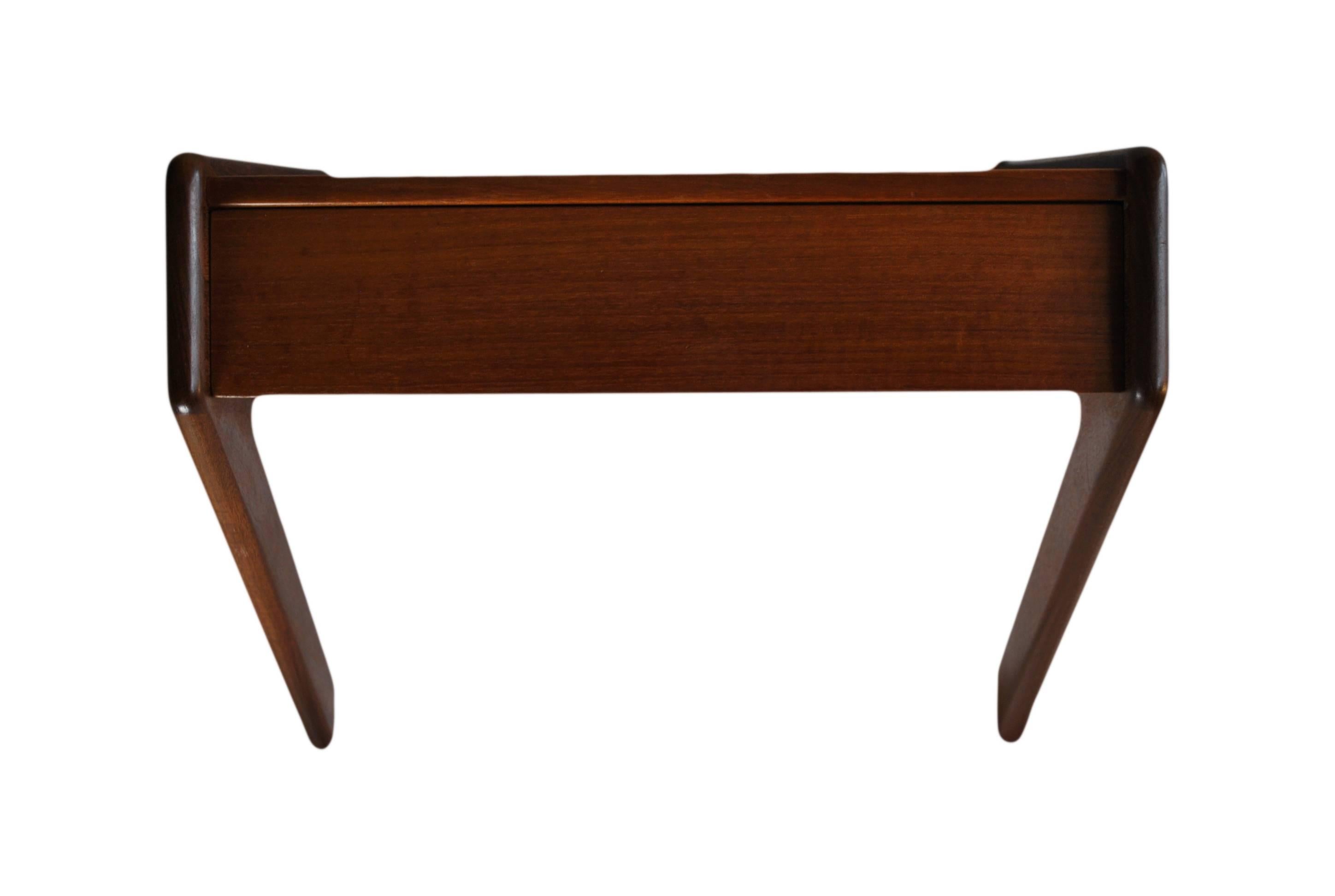 Pair of Danish floating nightstands with drawer, circa 1960s. Constructed in teak and Afromosia.