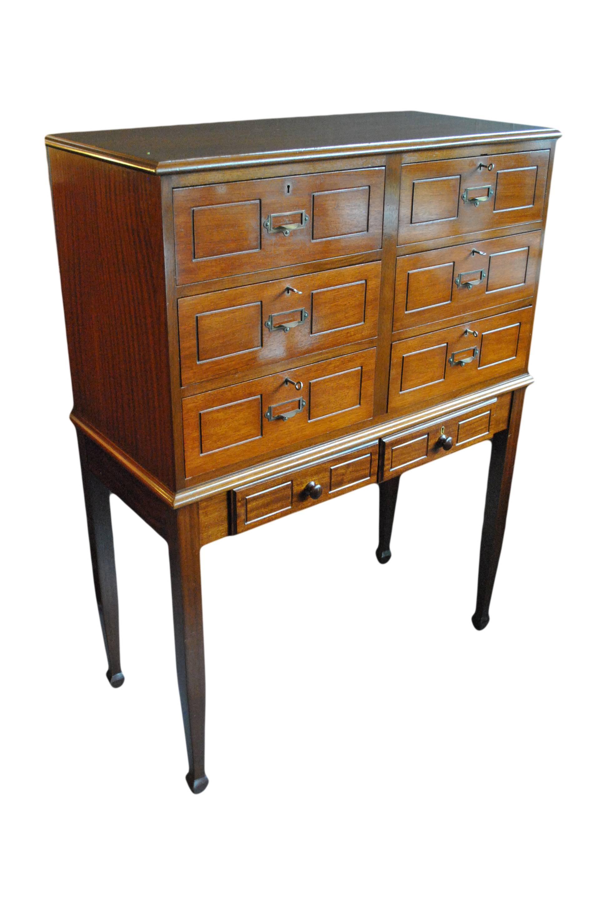 English haberdashers shop cabinet, early 20thC. Bespoke piece of mahogany furniture with a full set of locking drawers. The drawers have inner removable sections. 
In wonderful condition throughout.
