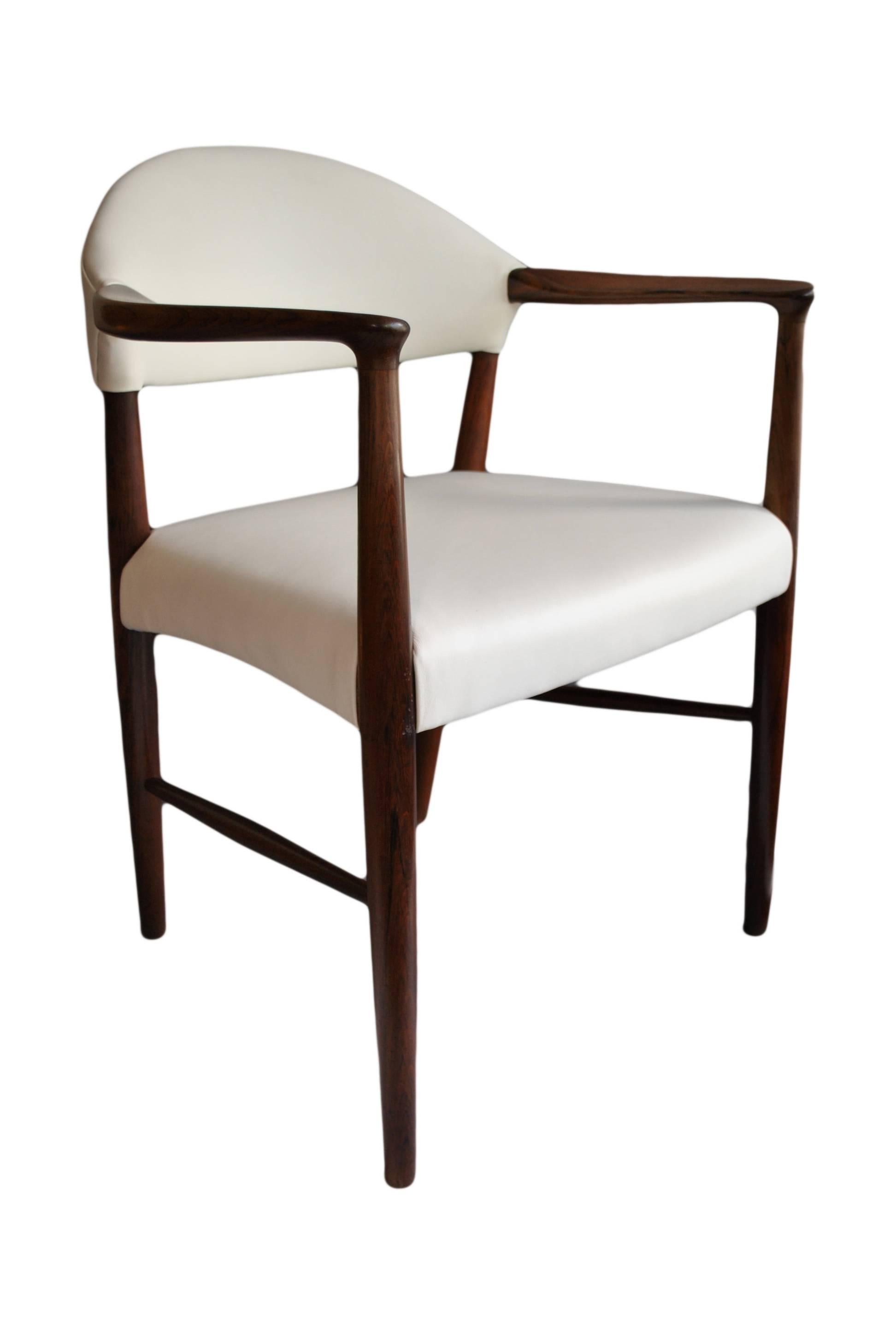 Sculptural chair by Kurt Olsen and manufactured by SM Mobler, Denmark, circa 1960.
Newly reupholstered in white leather. Re-polished frame.