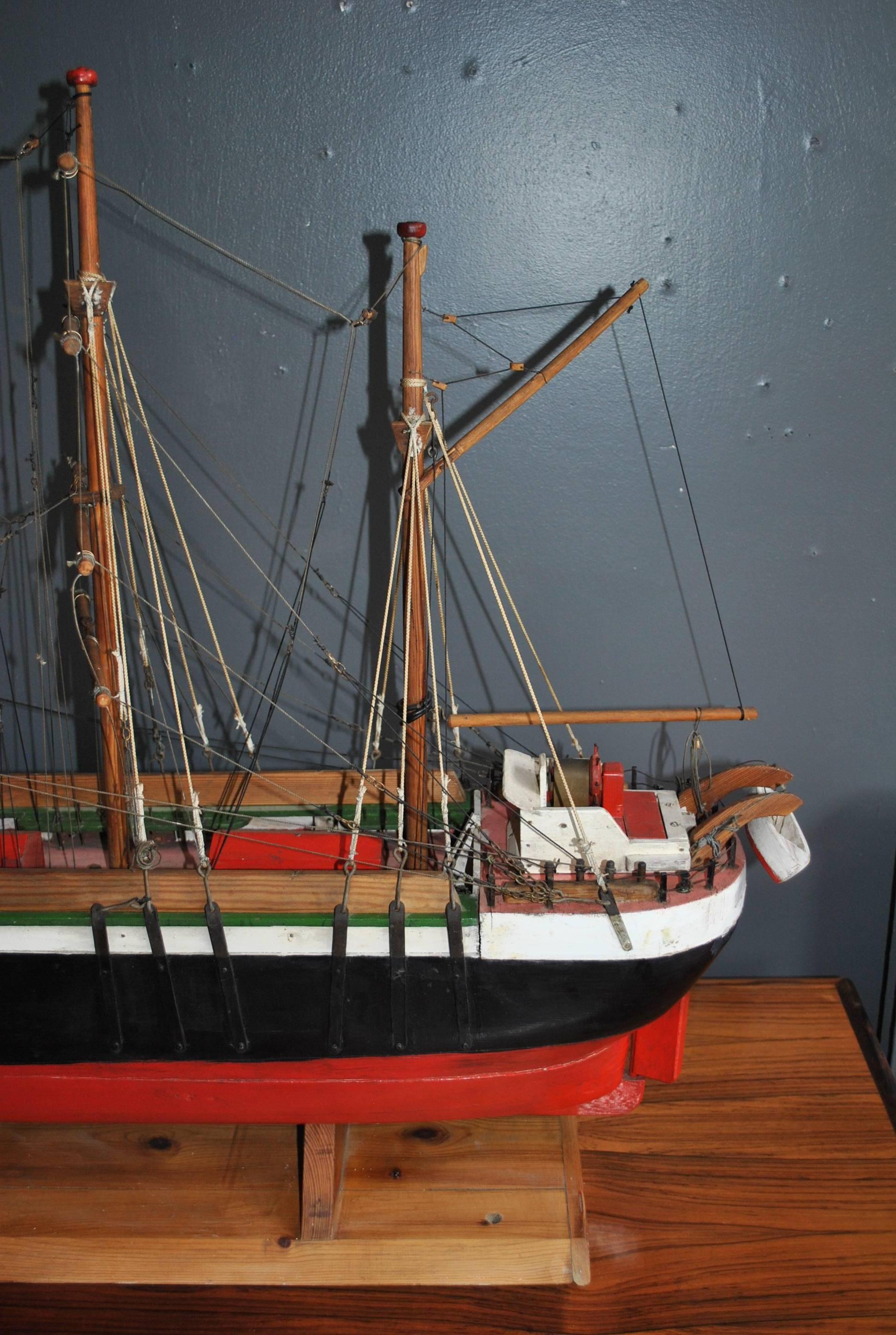 A charming large model tall ship built in Finland, circa 1950.
Solid carved hull. Handmade from scratch. All original paintwork. Great scale. Named 'Hajoa'.