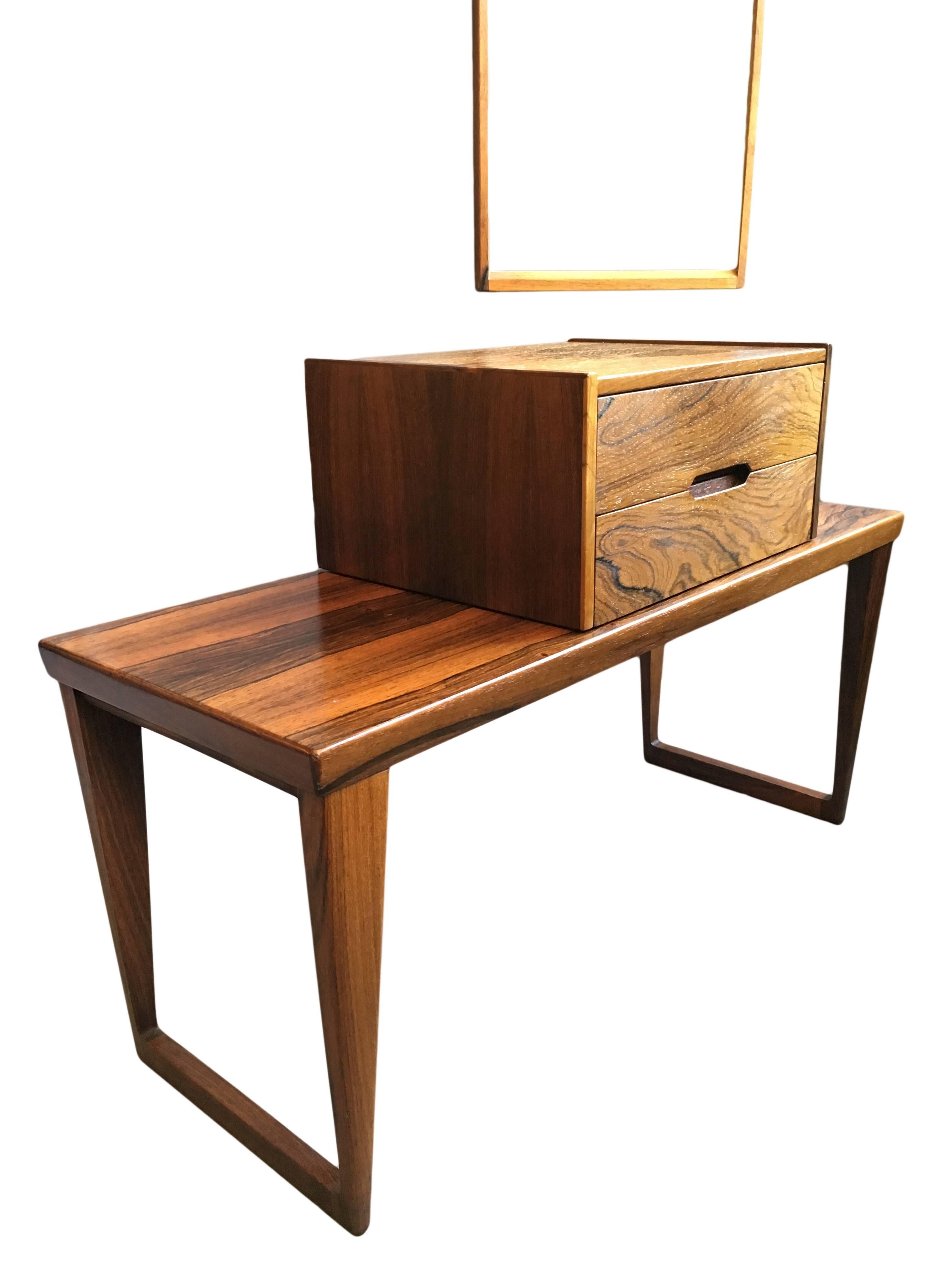 Superb full set by Aksel Kjersgaard - Kai Kristiansen circa 1960, Denmark.
The finest rosewood, bench, chest of drawers and mirror. The chest can be placed either on the bench or used separately. All original set with Aksel makers mark to each.