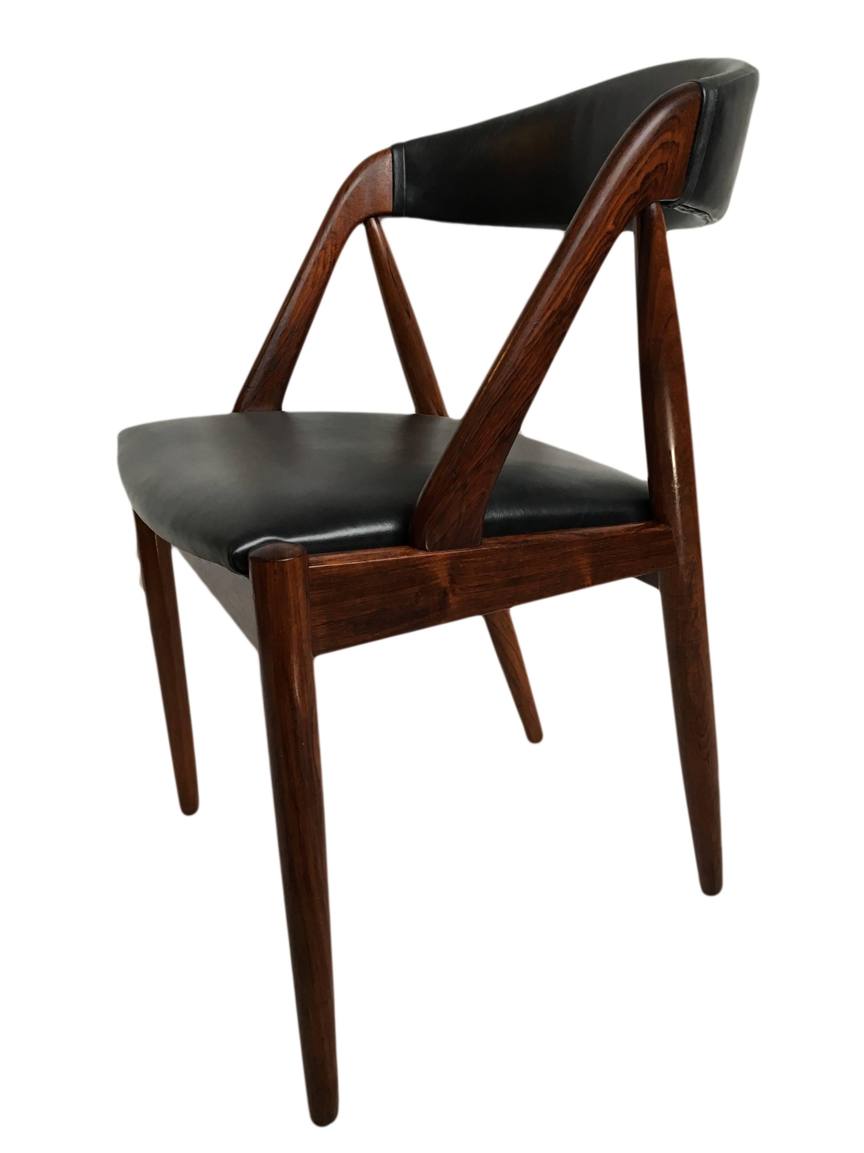 Leather Fully restored set of 4 Rosewood Kai Kristiansen Dining Chairs.