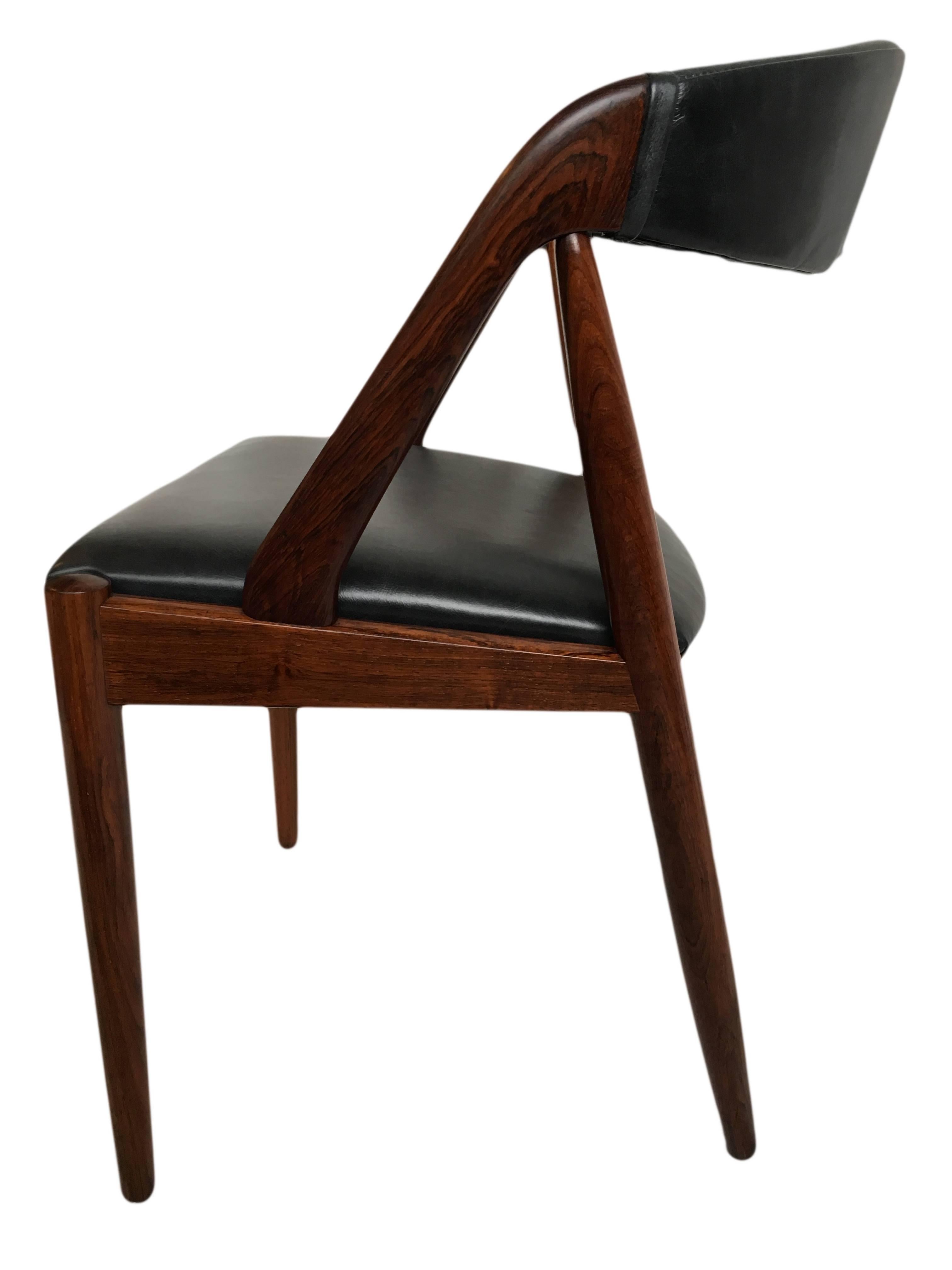 20th Century Fully restored set of 4 Rosewood Kai Kristiansen Dining Chairs.