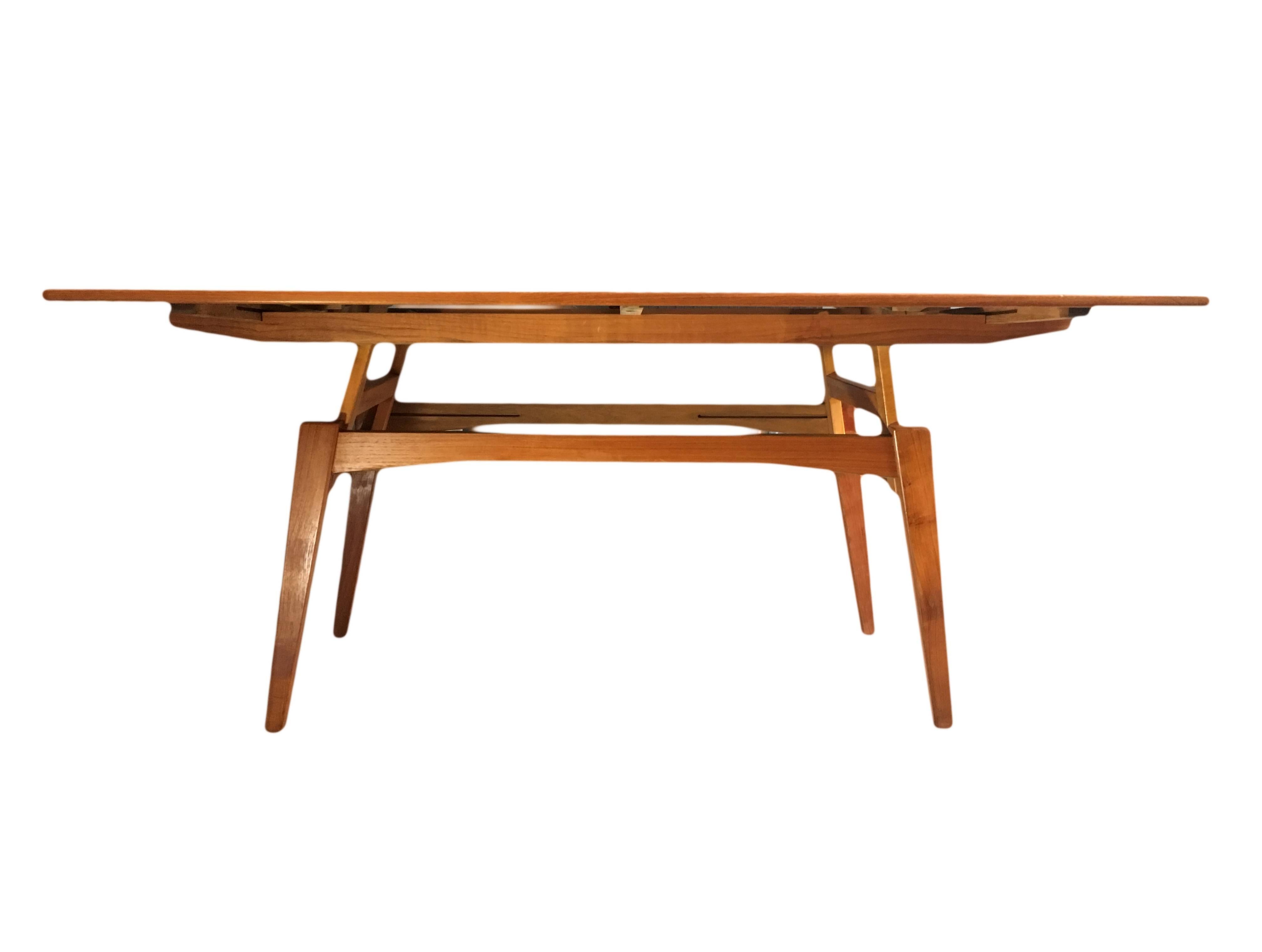 Innovative metamorphic table design by Kai Kristiansen for Trioh, circa 1960. Teak. Great condition. Two available.
Coffee table to dining table in a few easy moves.
U.S shipping available.