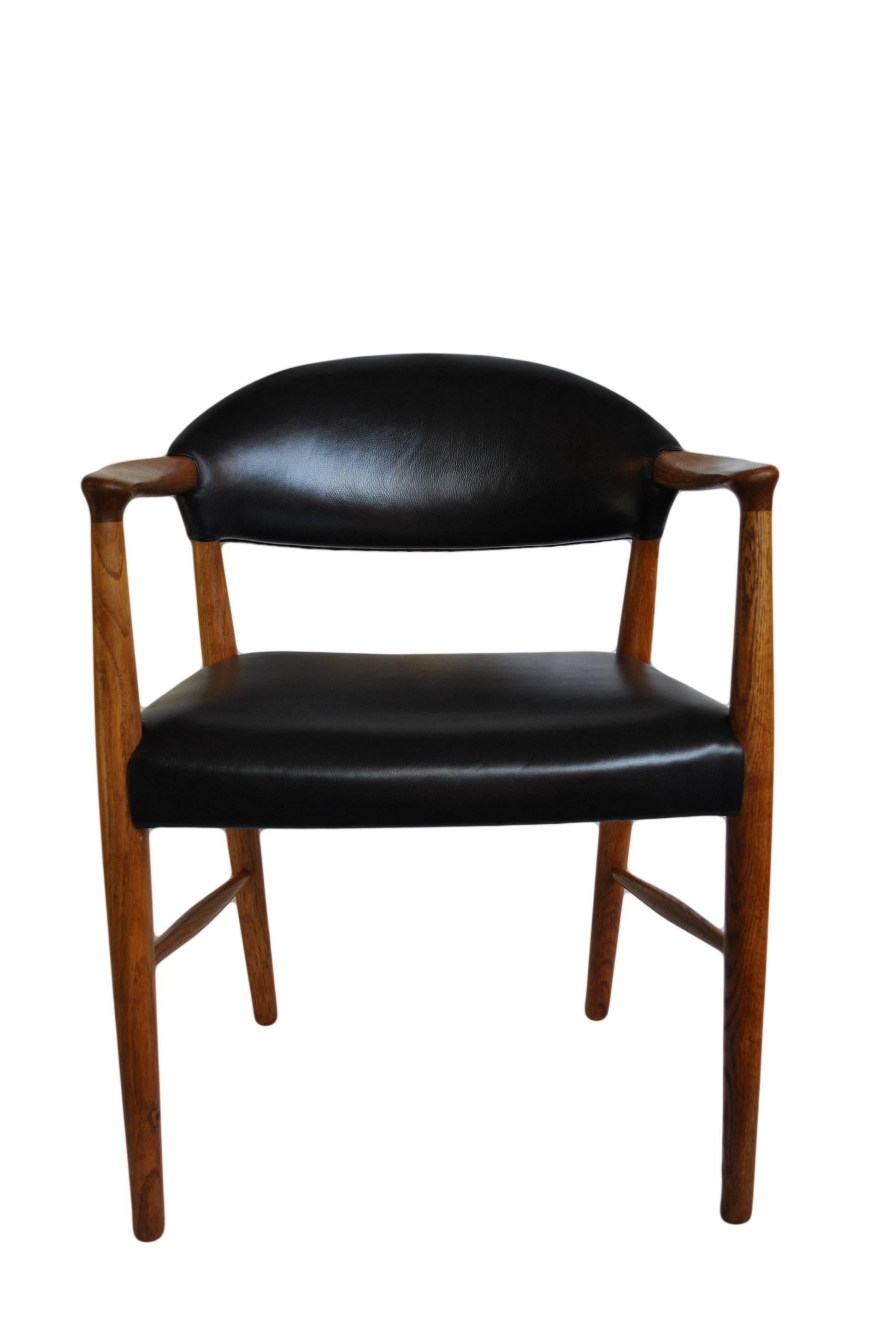 Mid-Century Modern Kurt Olsen chair, fully reupholstered in black leather.