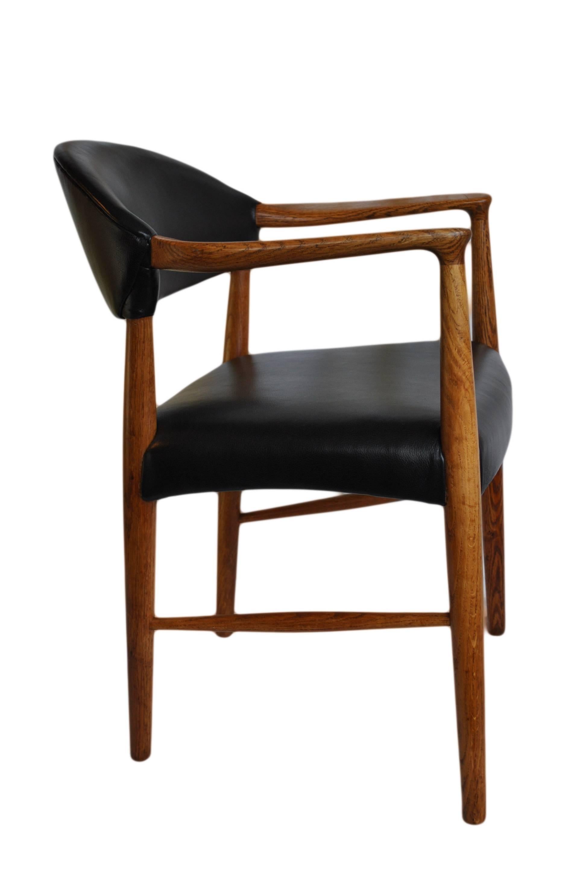 20th Century Kurt Olsen chair, fully reupholstered in black leather.