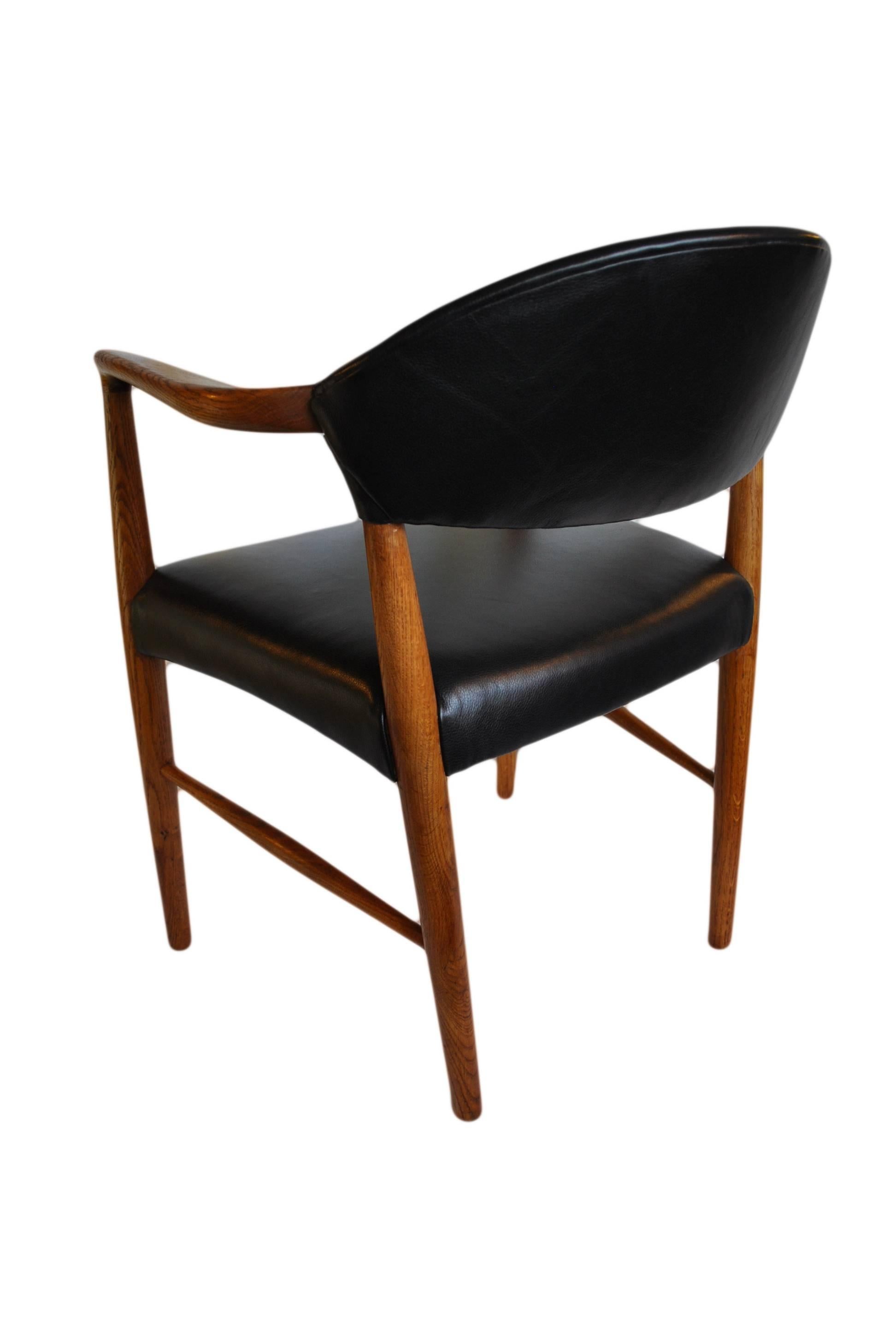 Kurt Olsen chair, fully reupholstered in black leather. In Excellent Condition In London, GB