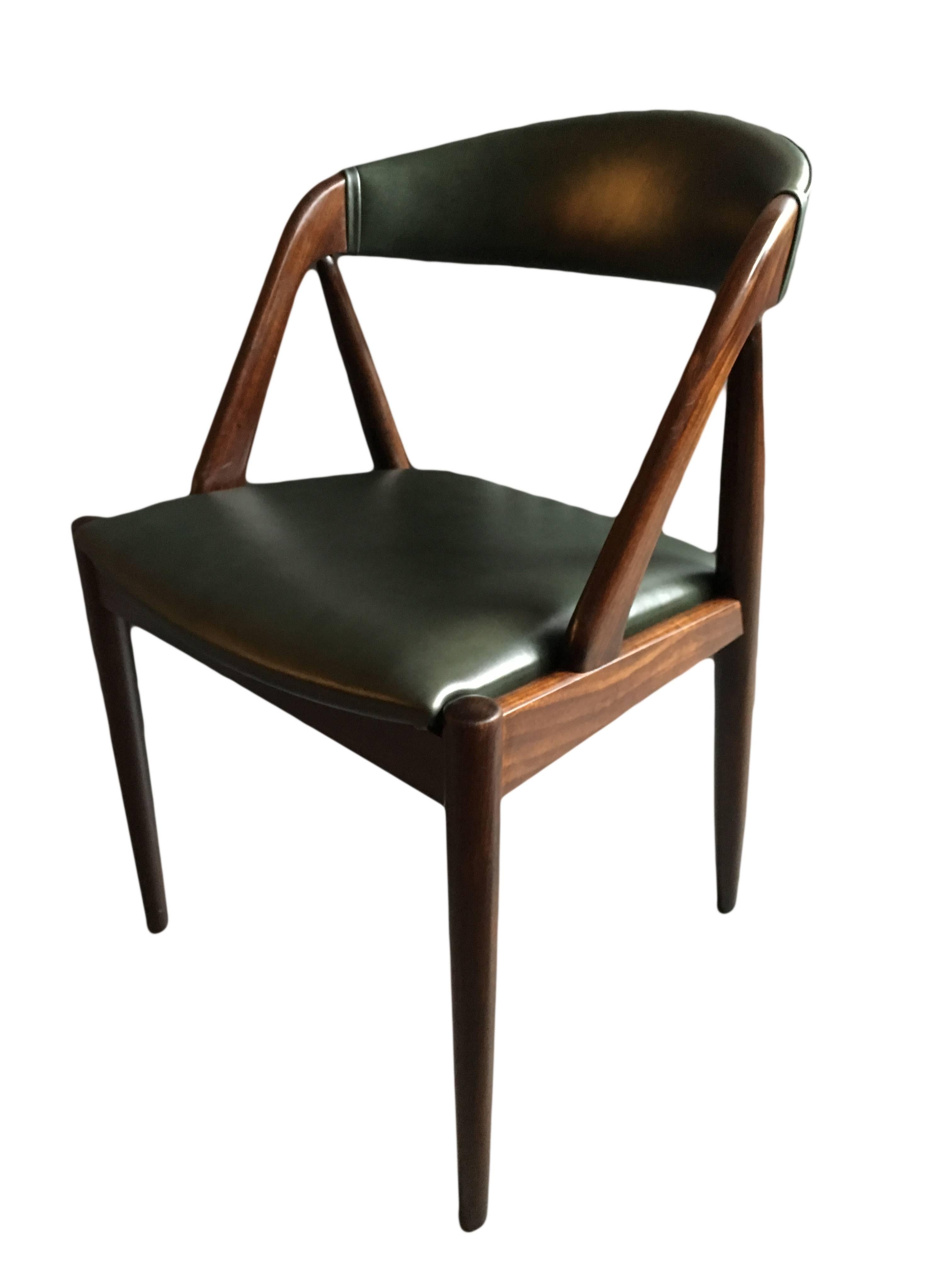 Set of six (more available) model 31 Kai Kristiansen dining chairs. Produced in Denmark, circa 1960.
Dark repolished teak frames with new Italian leather upholstery.
 