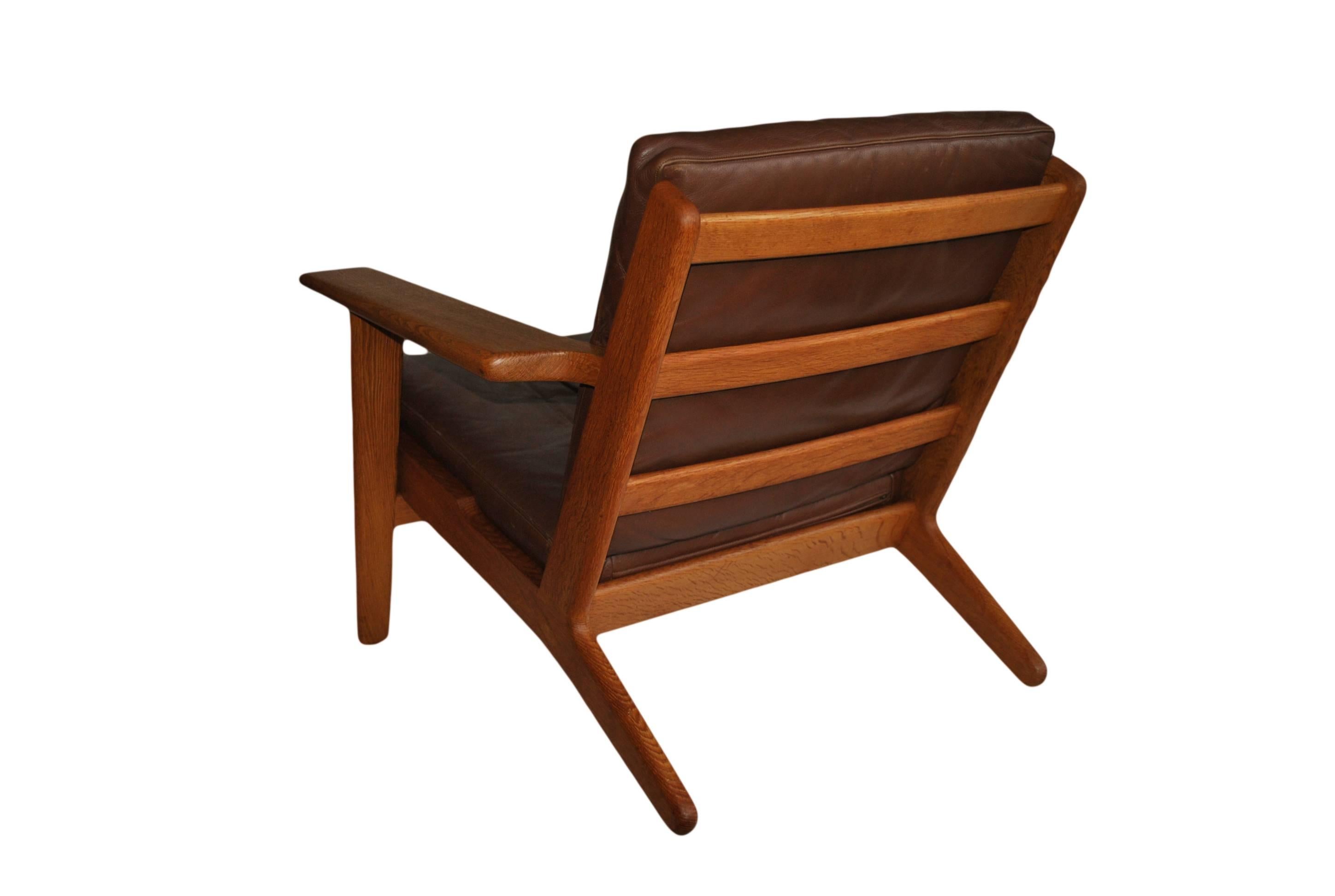 Leather Pair of Hans J Wegner ge290 Oak Lounge Chairs, 1950s. Refurbished.