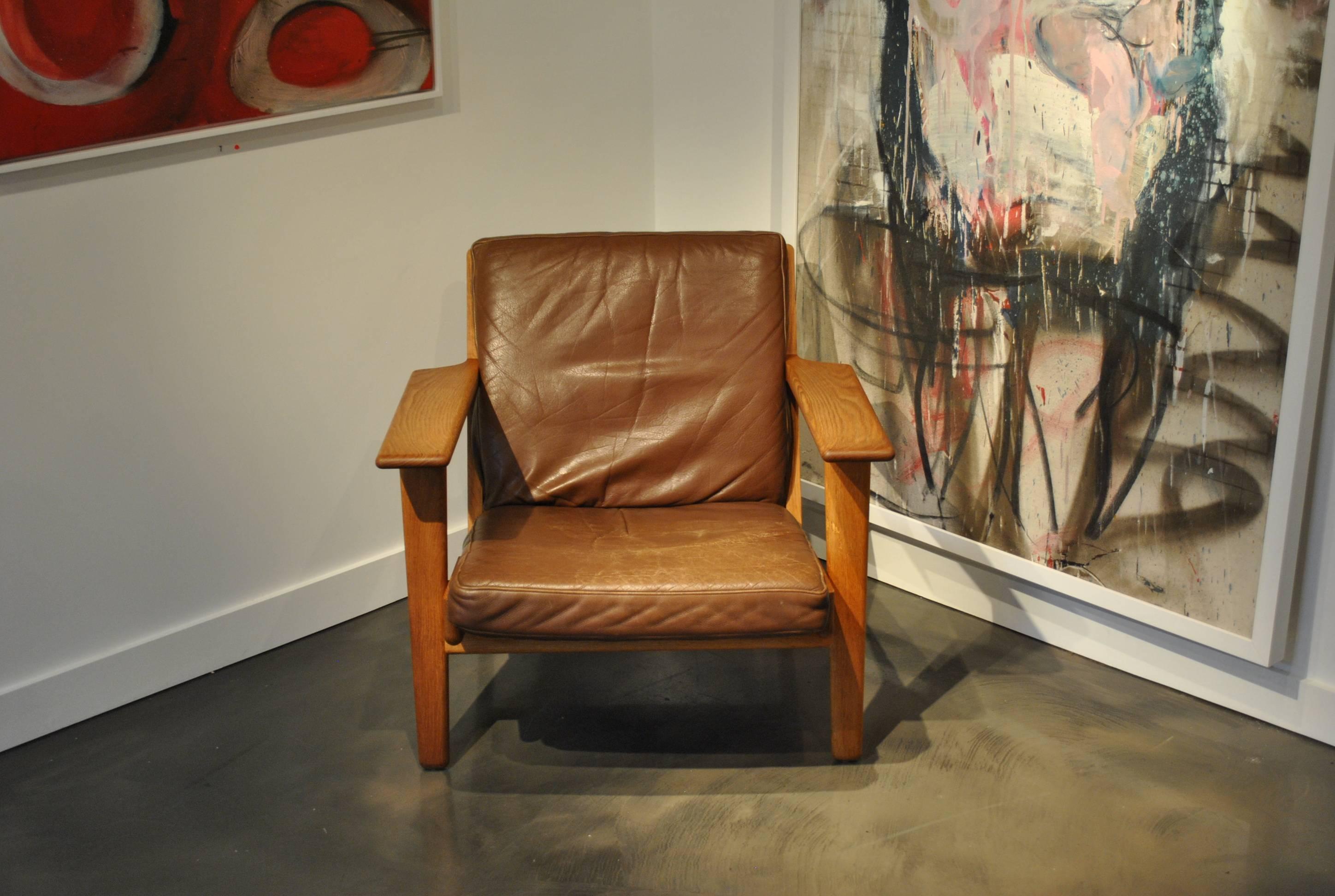 Mid-Century Modern Pair of Hans J Wegner ge290 Oak Lounge Chairs, 1950s. Refurbished.