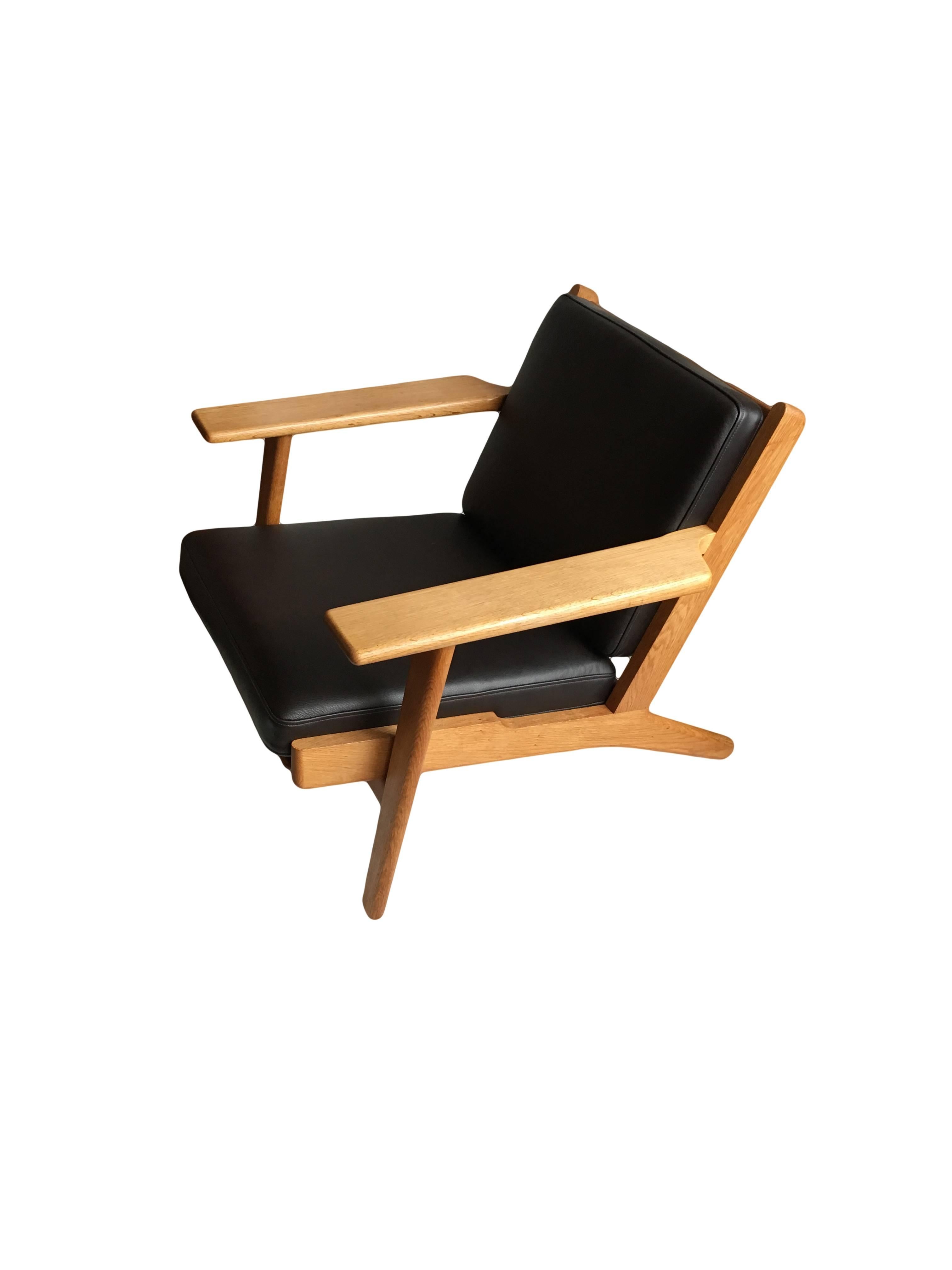 The Classic GE290 lounge chair by Danish master designer Hans J Wegner. The original 1950s model from GETAMA, Denmark. Refurbished European oak frames reupholstered in Italian leather cushions.
Original makers marks still intact underneath.

 