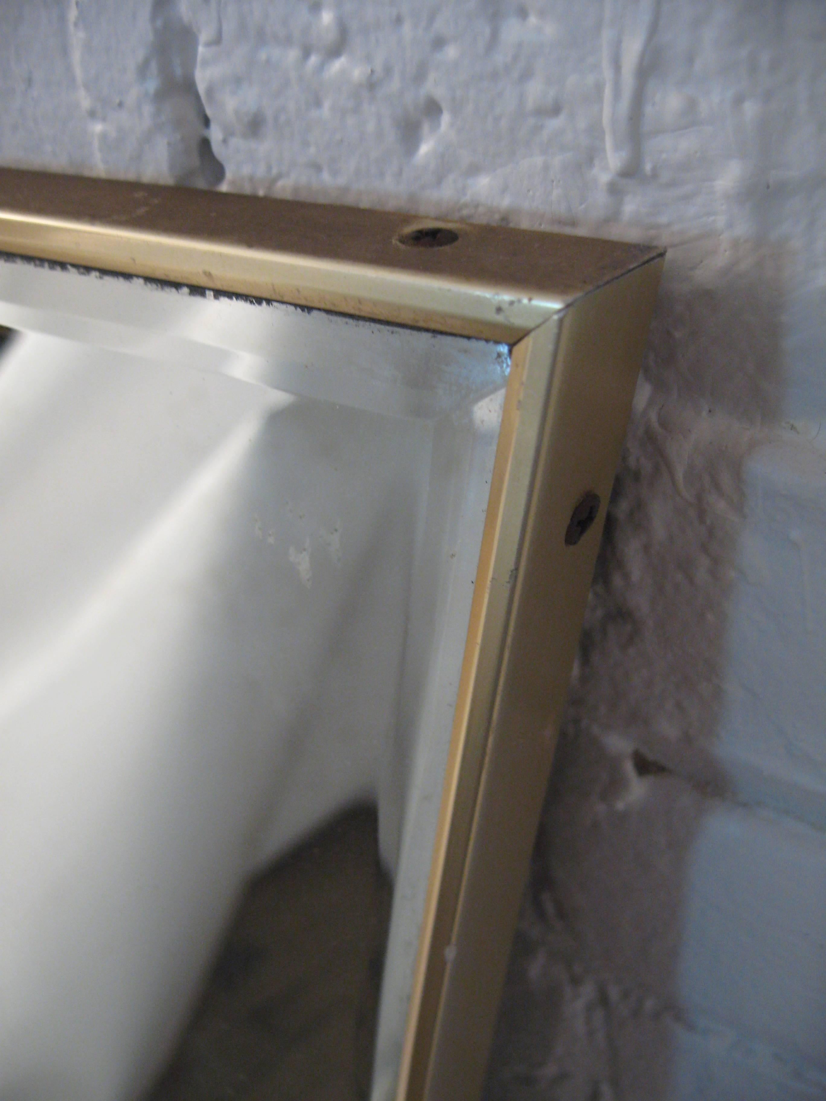 American 1950s Moderne Waisted Beveled Mirror
