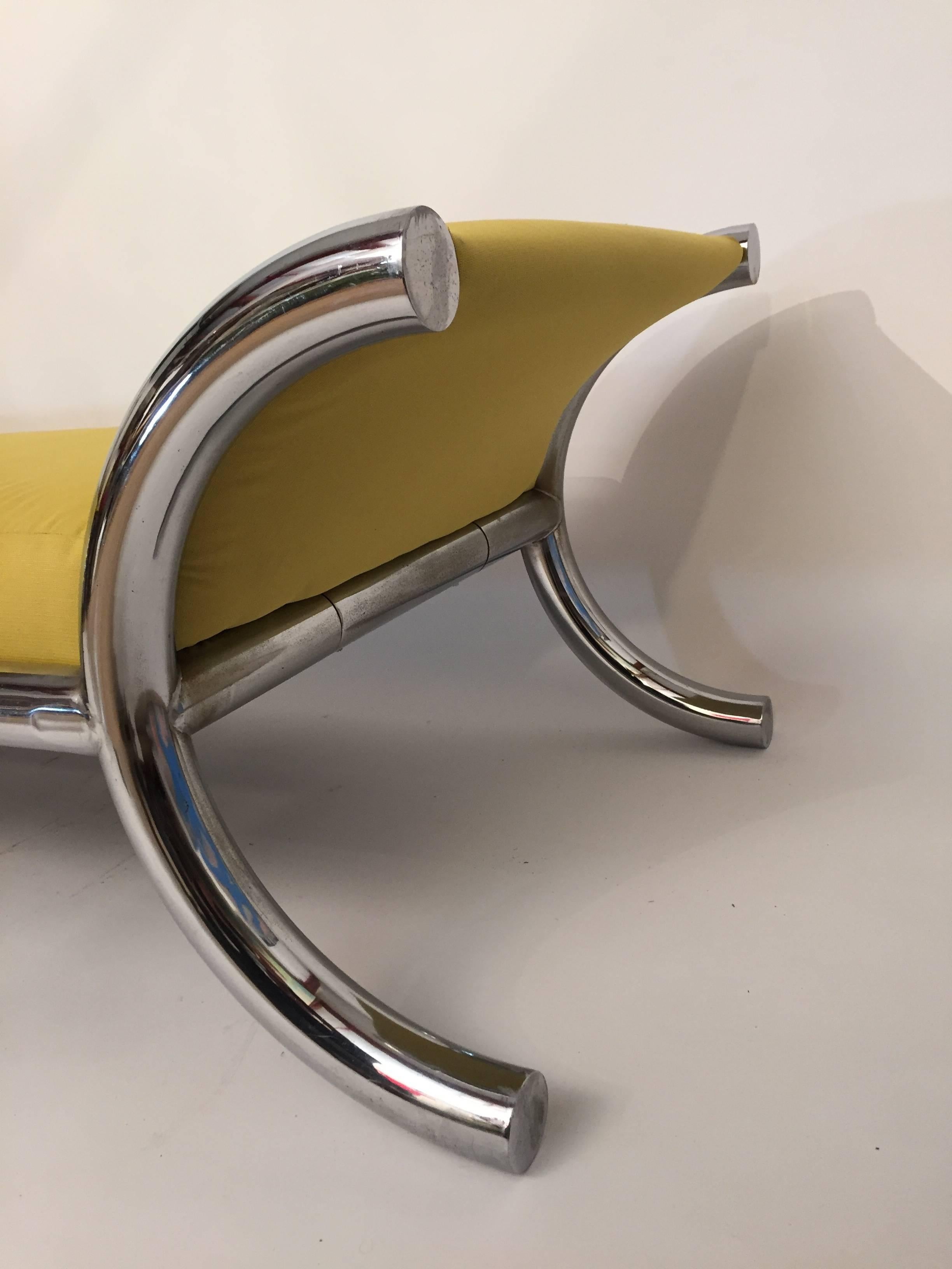 Simple, sexy Italian design at its best. Tubular chrome frame supports two integrated curved side cushions and a single, long rectangular cushion. Signed, Made in Italy.