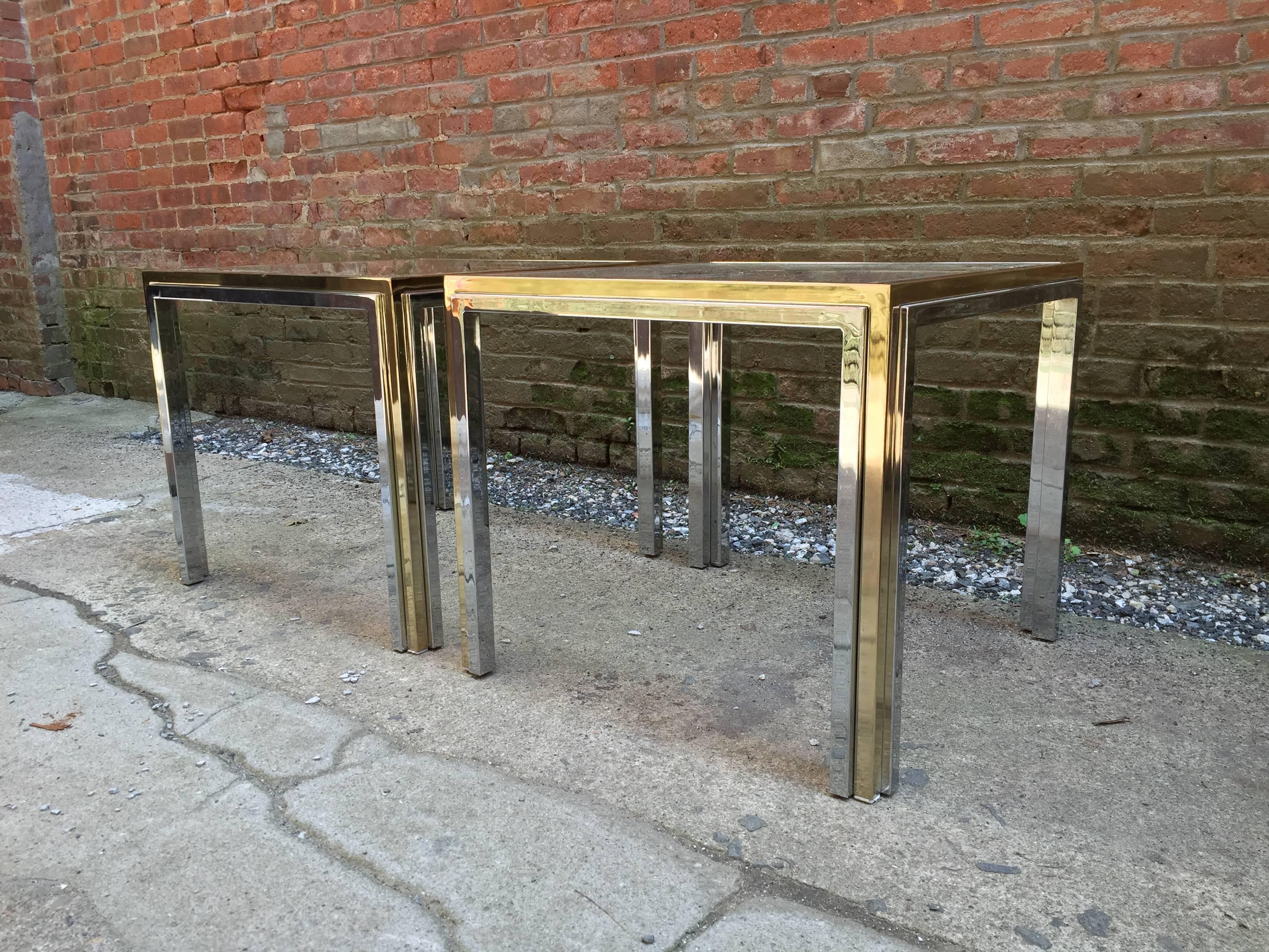 Amazing quality two-tone brass and chrome end tables, circa 1970-1980. Glass inserts measure 22.75