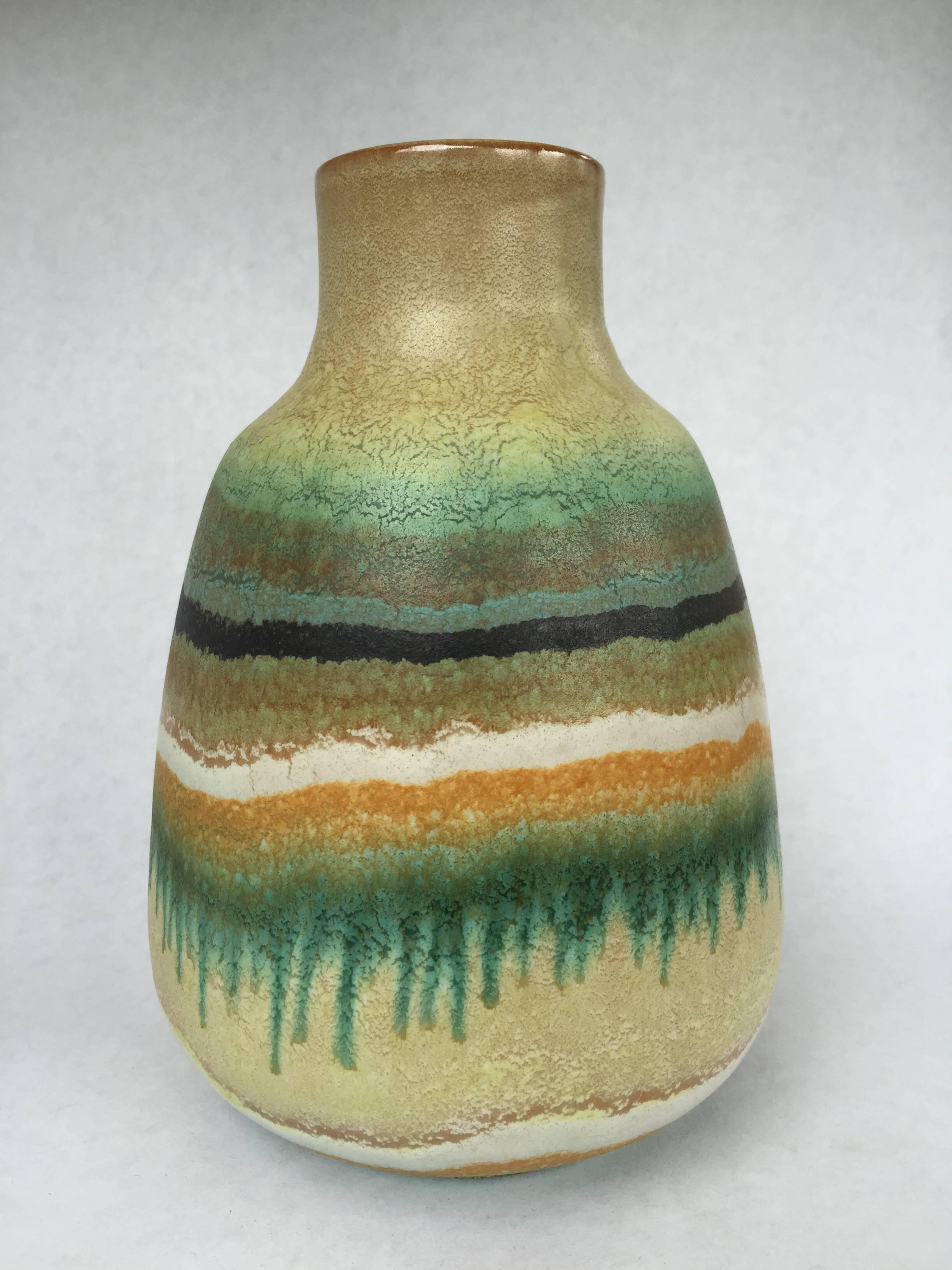 Beautiful matte finish drip glaze pottery vase signed Alvino Bagni. Fully signed on the bottom, A Bagni, Italy. Excellent and original condition.