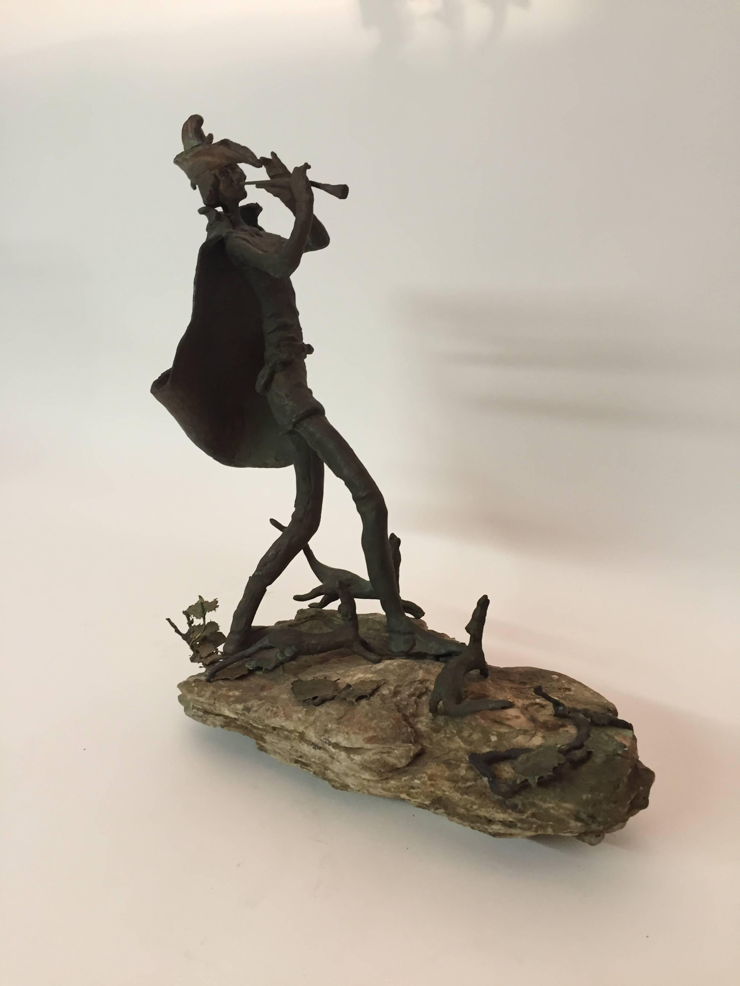 Amazing bronze rendition of the Brothers Grimm tale of the Pied Piper. The artist took a bit of artistic license and depicted dogs. Solid cast bronze sculpture on a petrified wood base. Two of the dogs and a piece of underbrush are free standing and