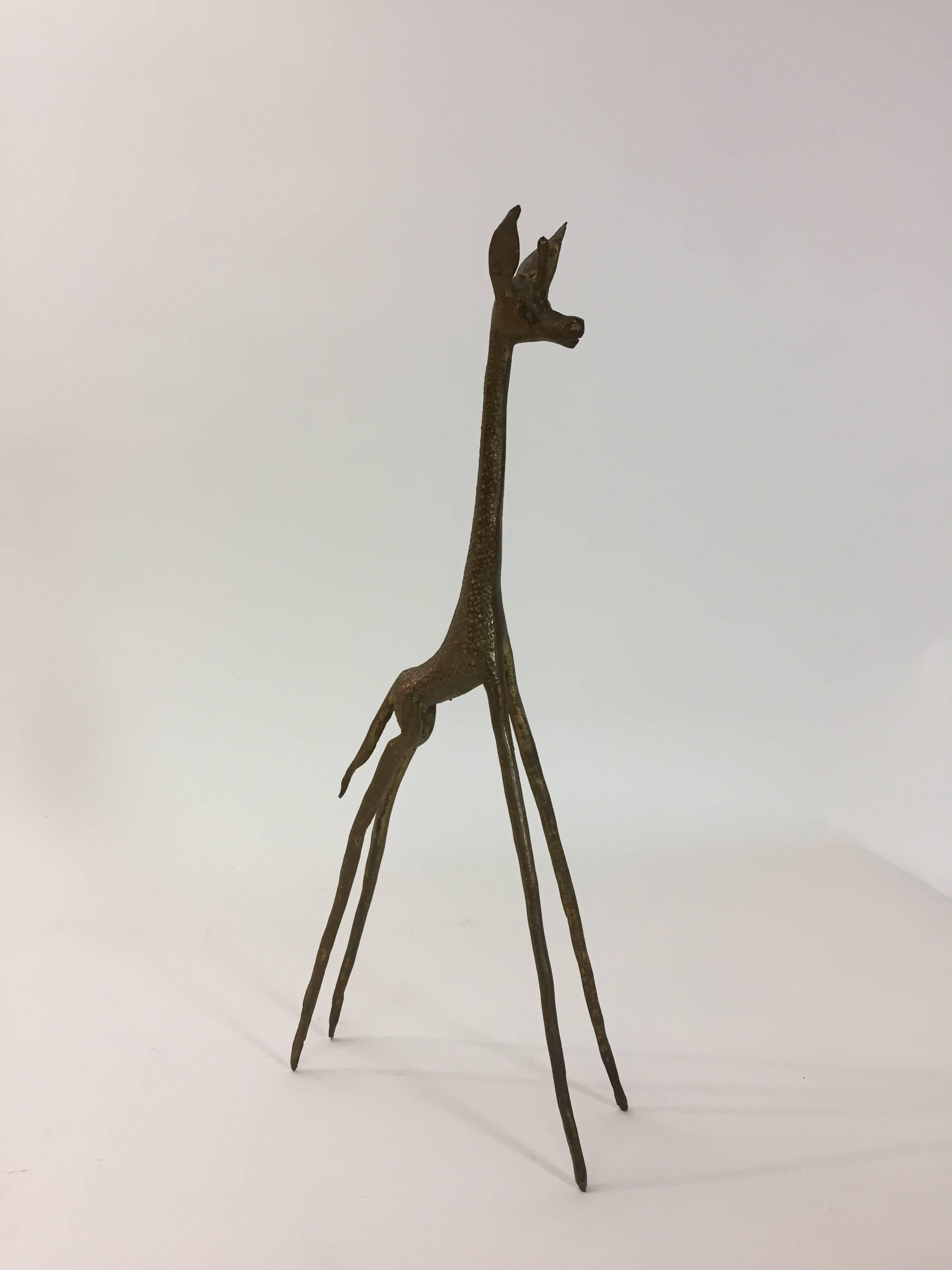 Brass baby giraffe figurine. Wonderful stylized baby brass giraffe.