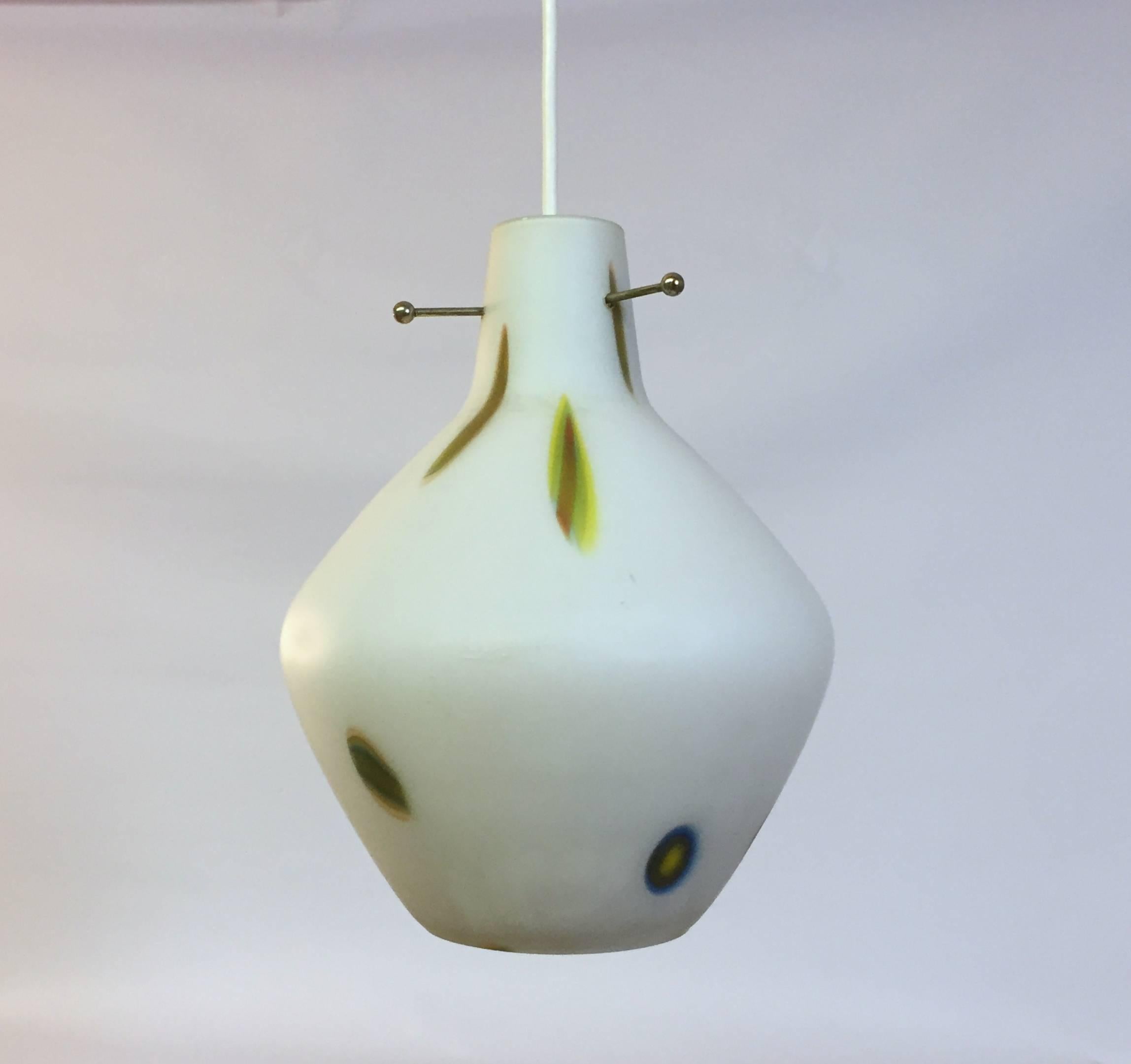 Beautiful frosted cased glass Swedish hanging pendant, circa 1960. Recently re-wired. Unsigned. The small foil 